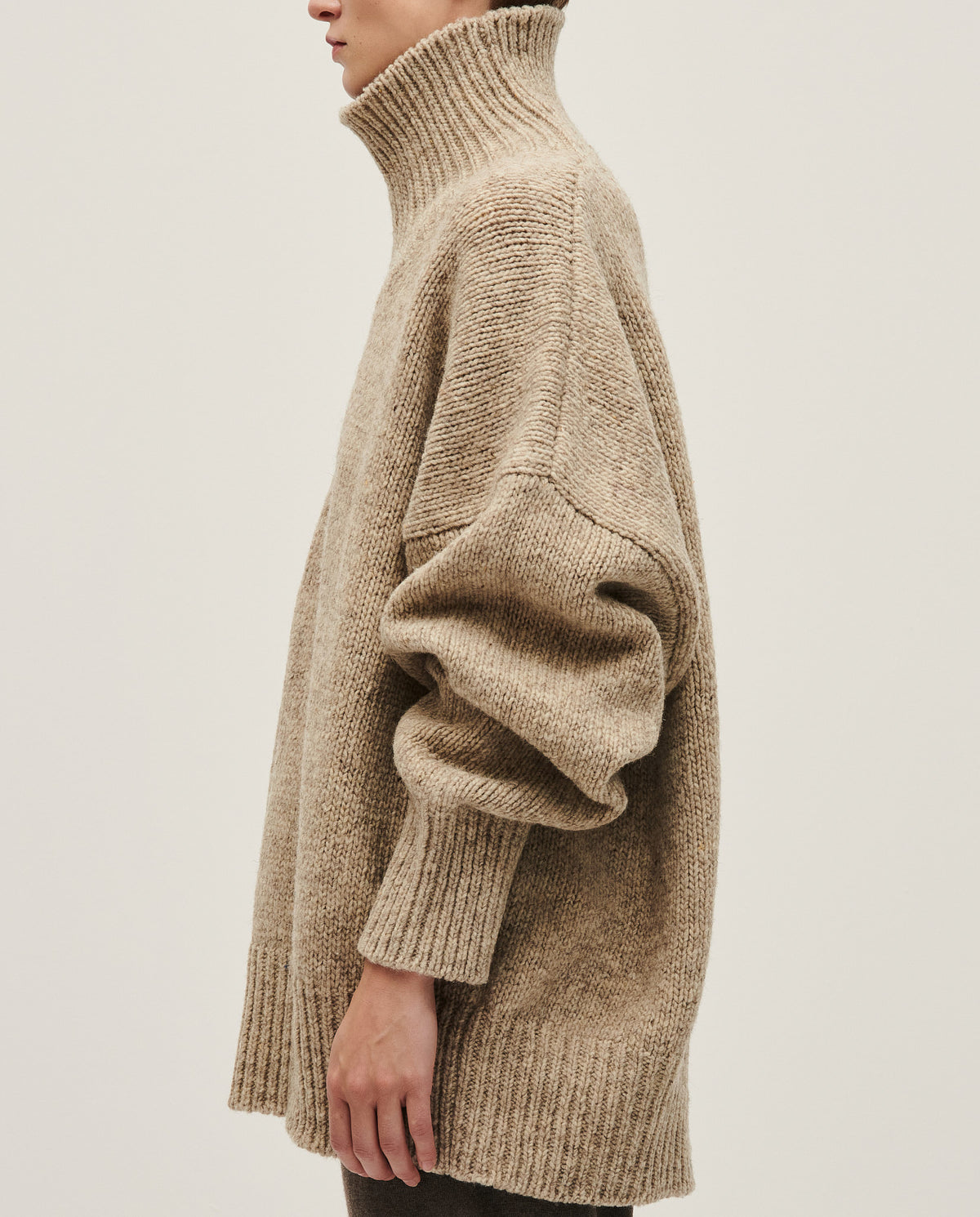 Babaà No17 Mist women's jumper featuring a cozy, soft knit fabric in a stylish, neutral color with a relaxed fit.