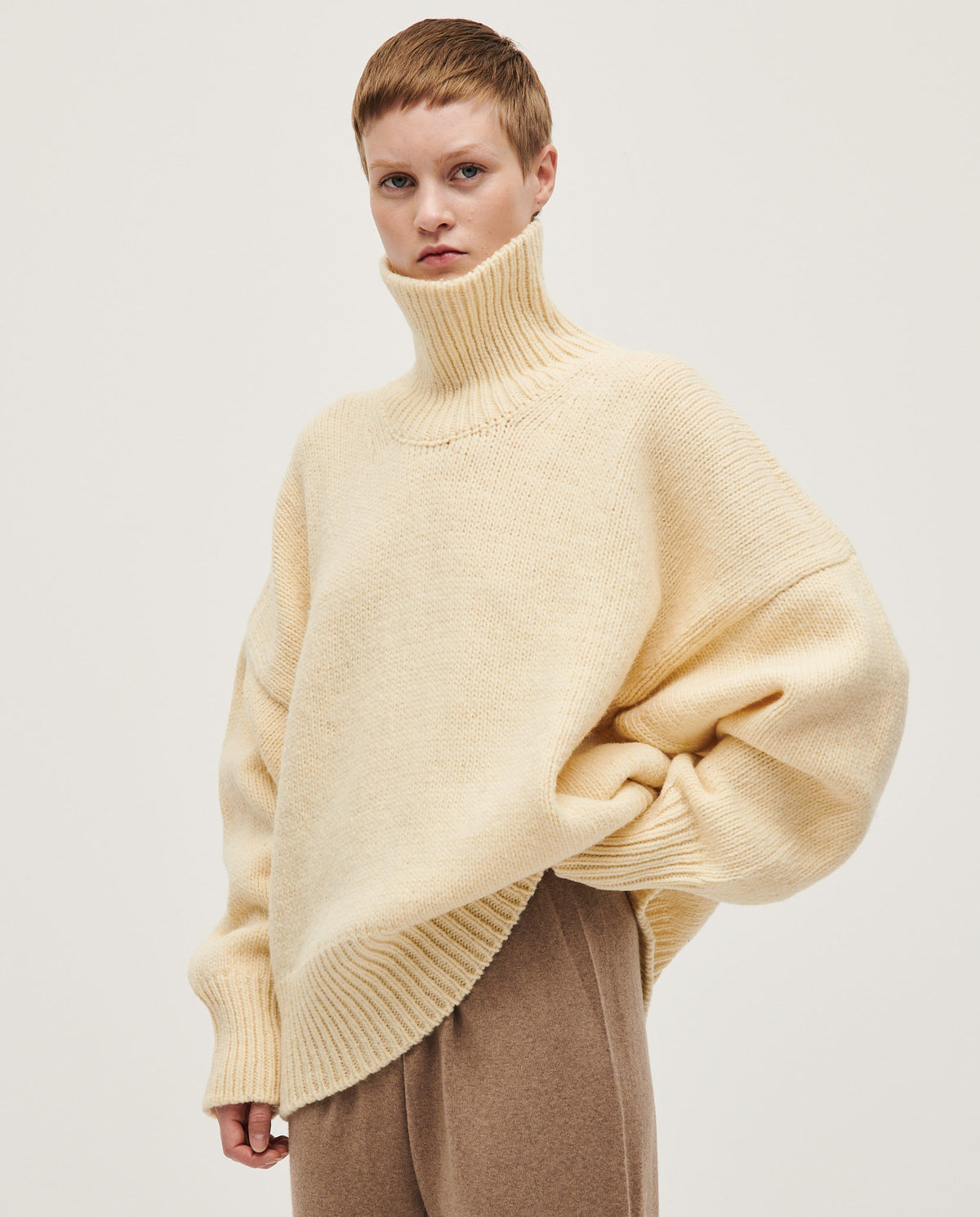 Babaà No17 Natural women's jumper, soft knit fabric in a relaxed fit, shown on a model with a neutral background