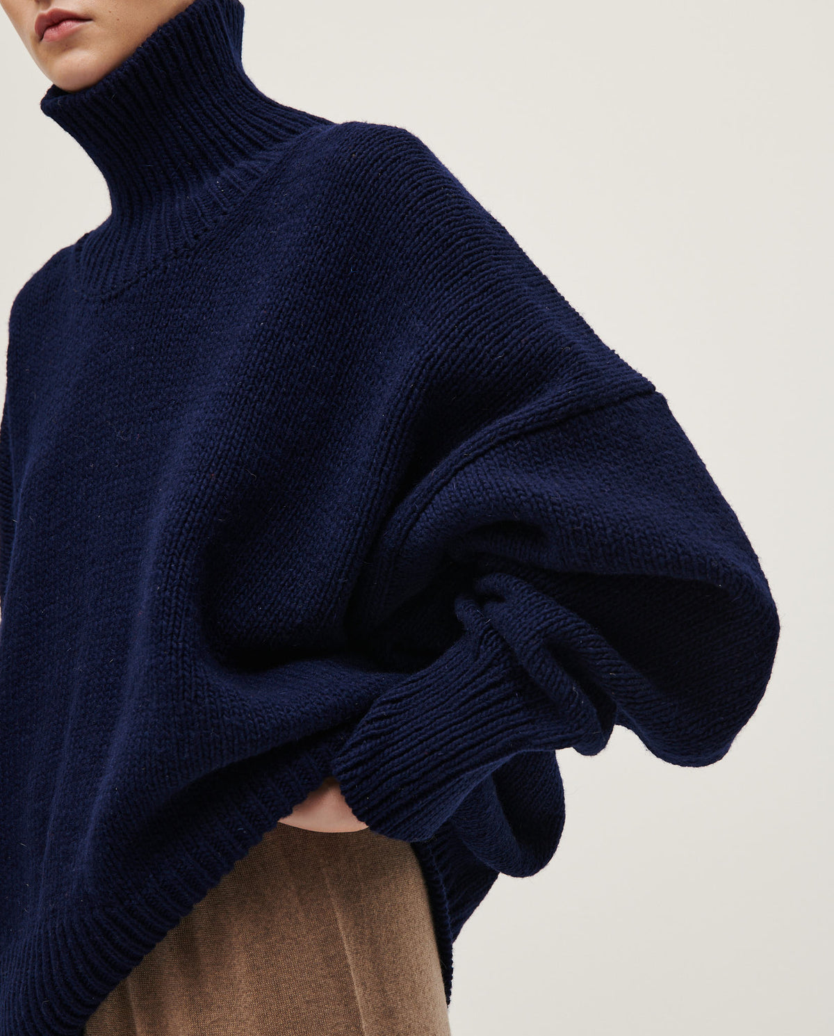 Navy Jumper No17 by Babaà, stylish women's knit sweater with a cozy fit, shown on a model in a casual setting.