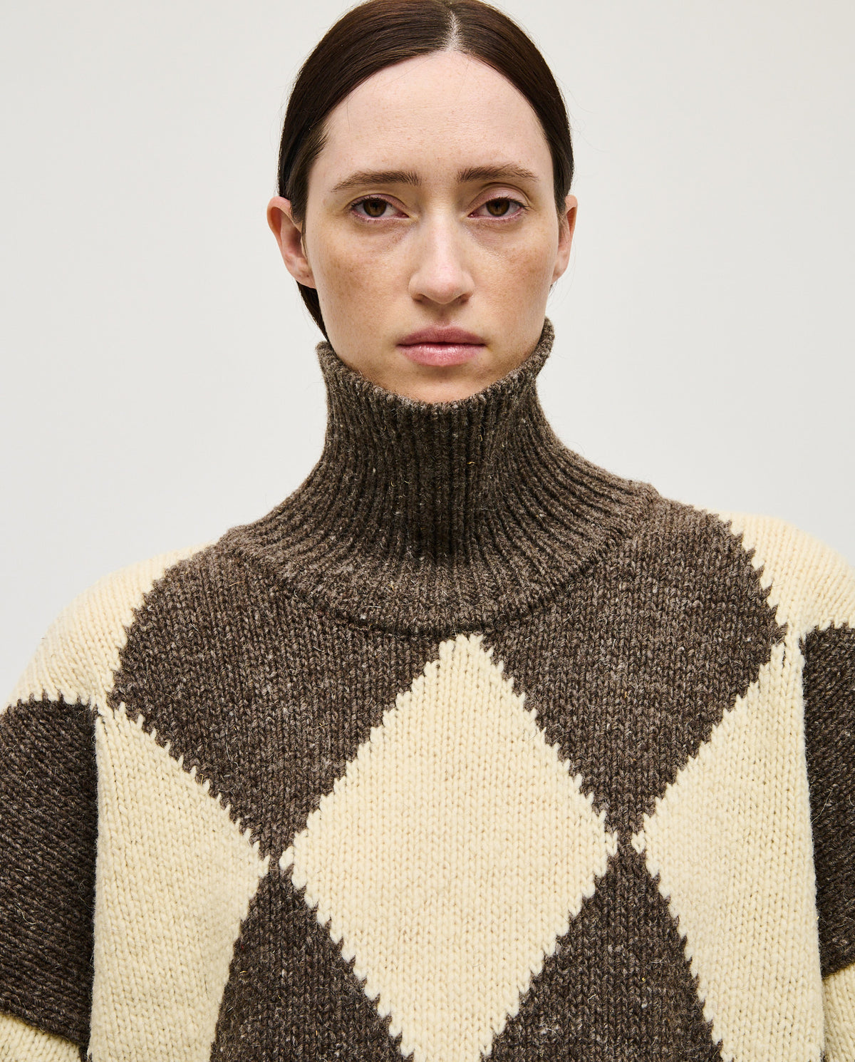 Woman wearing Babaà No17 Siesta jumper, soft knit in a relaxed fit, showcasing the stylish and comfortable sweater.