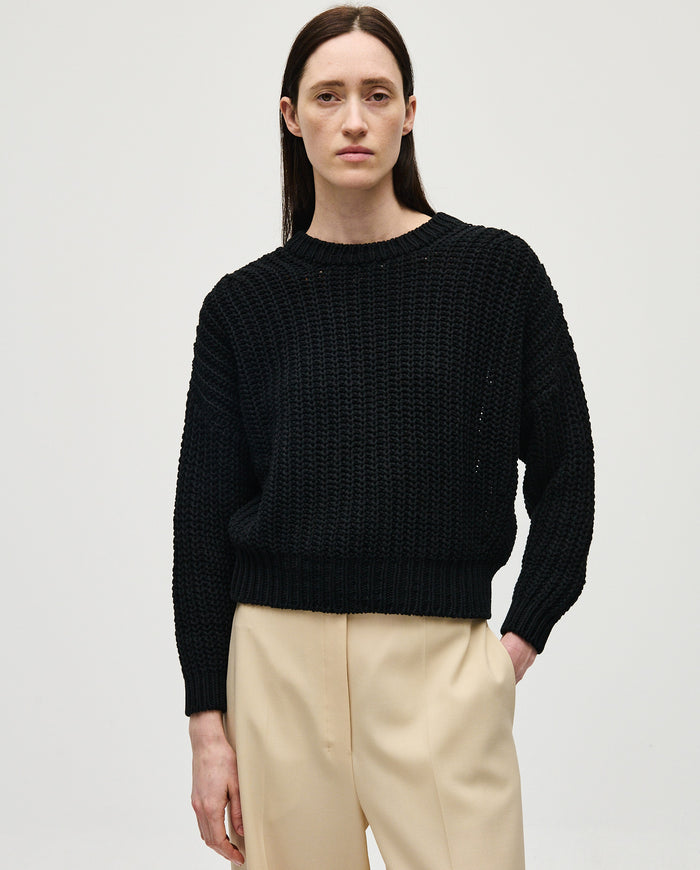 Black Babaà No18 woman’s jumper, casual knit sweater with a comfortable fit, shown on a model.