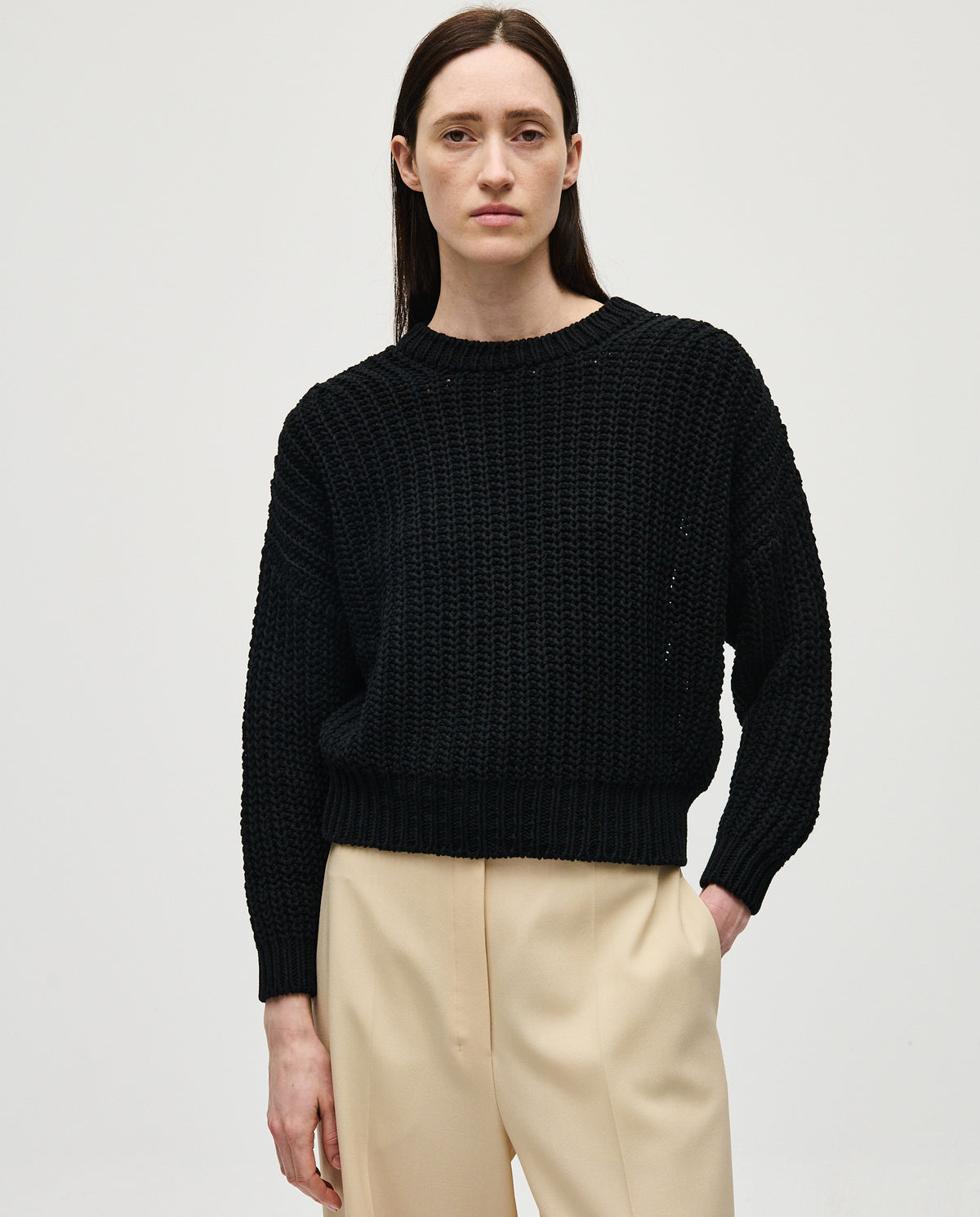 Black Babaà No18 woman’s jumper, casual knit sweater with a comfortable fit, shown on a model.