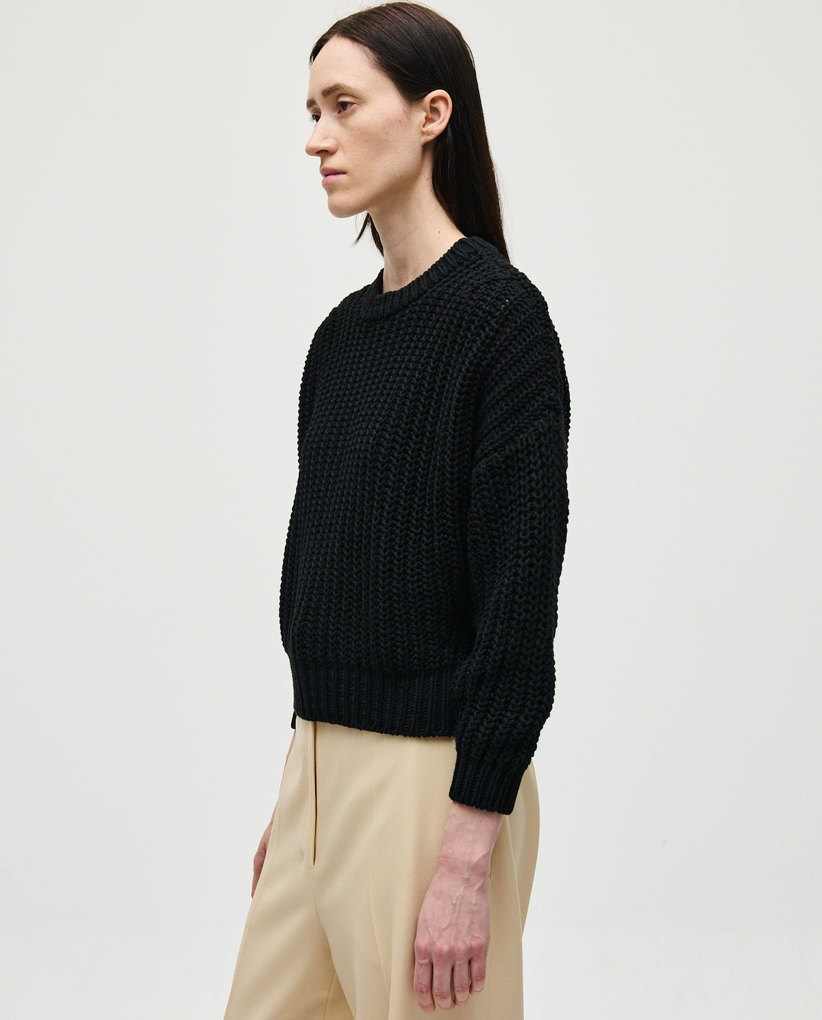 Black Babaà Jumper No18 for women, featuring a cozy knit design and fitted silhouette, shown on a model.