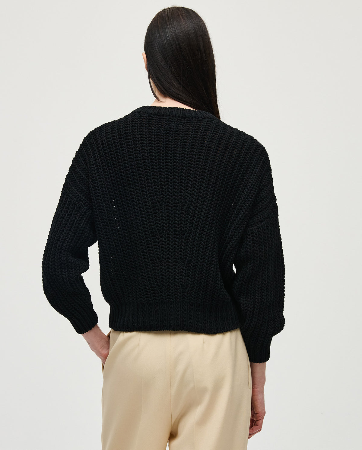 Black Babaà No18 women's jumper, soft knit fabric, fitted design, featuring long sleeves and a ribbed neckline.