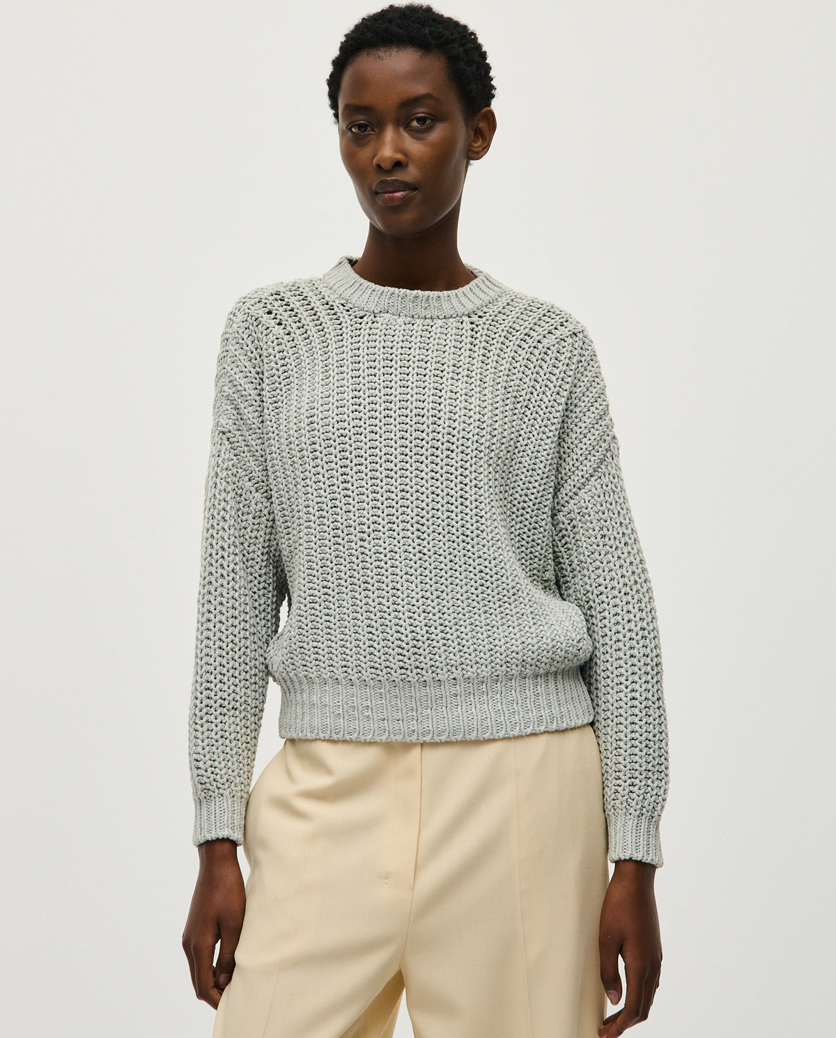 Babaà No18 Chalk women's jumper displayed on a model, featuring a cozy knit design and neutral chalk color.