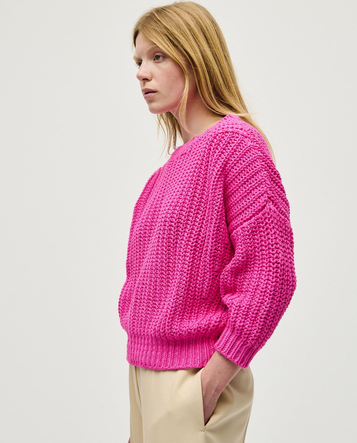 Babaà Jumper No18 with hibiscus flower pattern worn by a woman, featuring a cozy, stylish knit design.