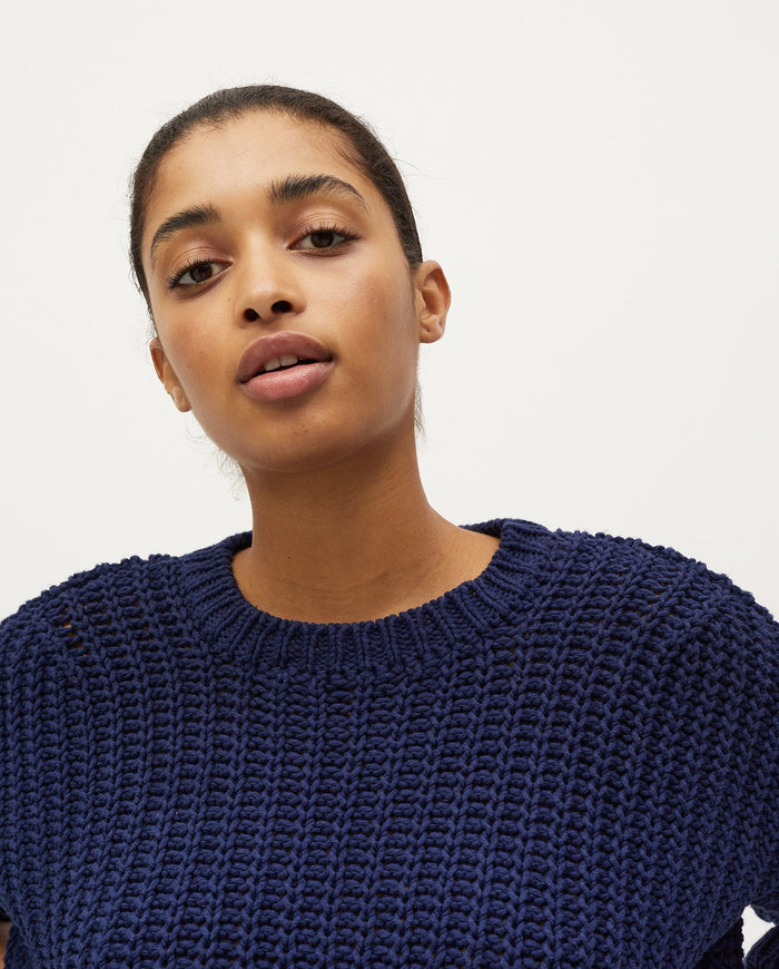 Woman wearing navy Babaà Jumper No18, featuring a cozy, stylish knit design perfect for casual wear.