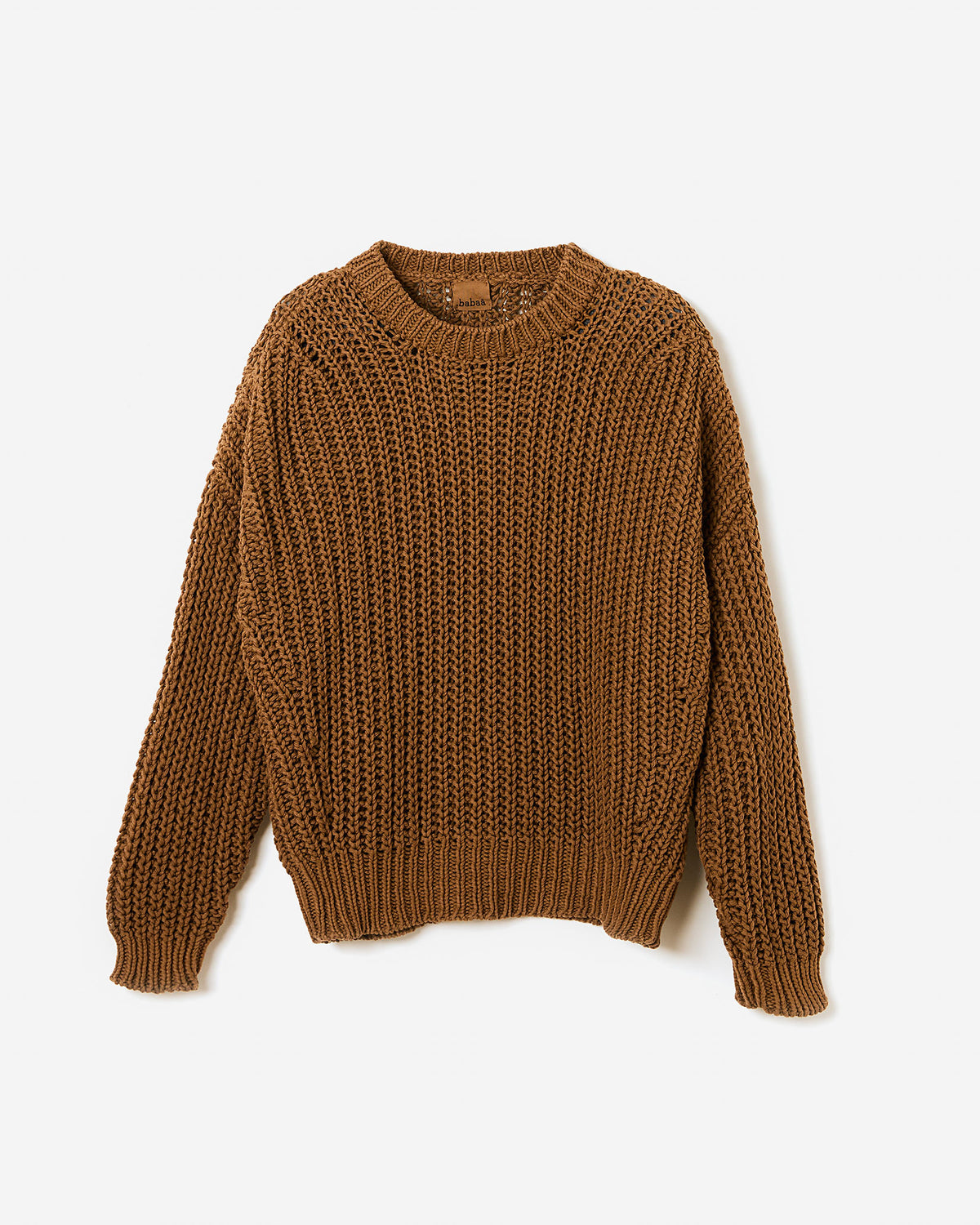 Silhouette of a woman wearing Babaà Jumper No18 Sukkari, a stylish knit sweater with a relaxed fit and cozy design.