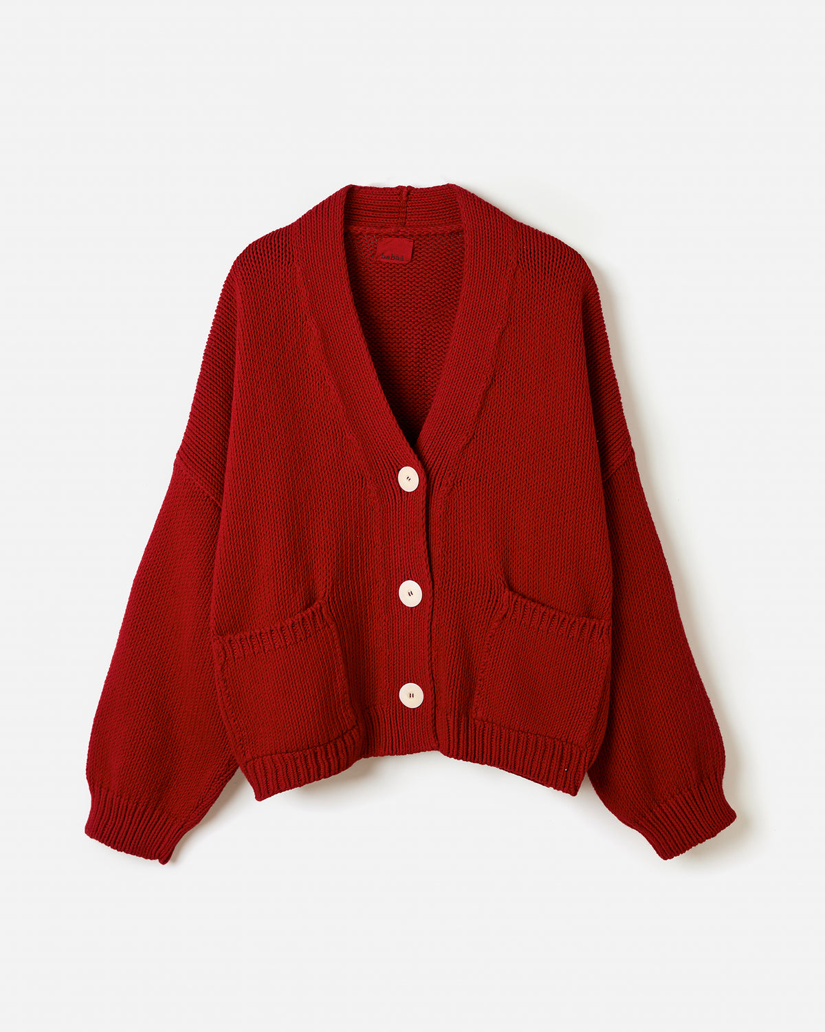 Babaà No22 Persephone cardigan worn by a woman, featuring a soft knit silhouette in a stylish, cozy design.