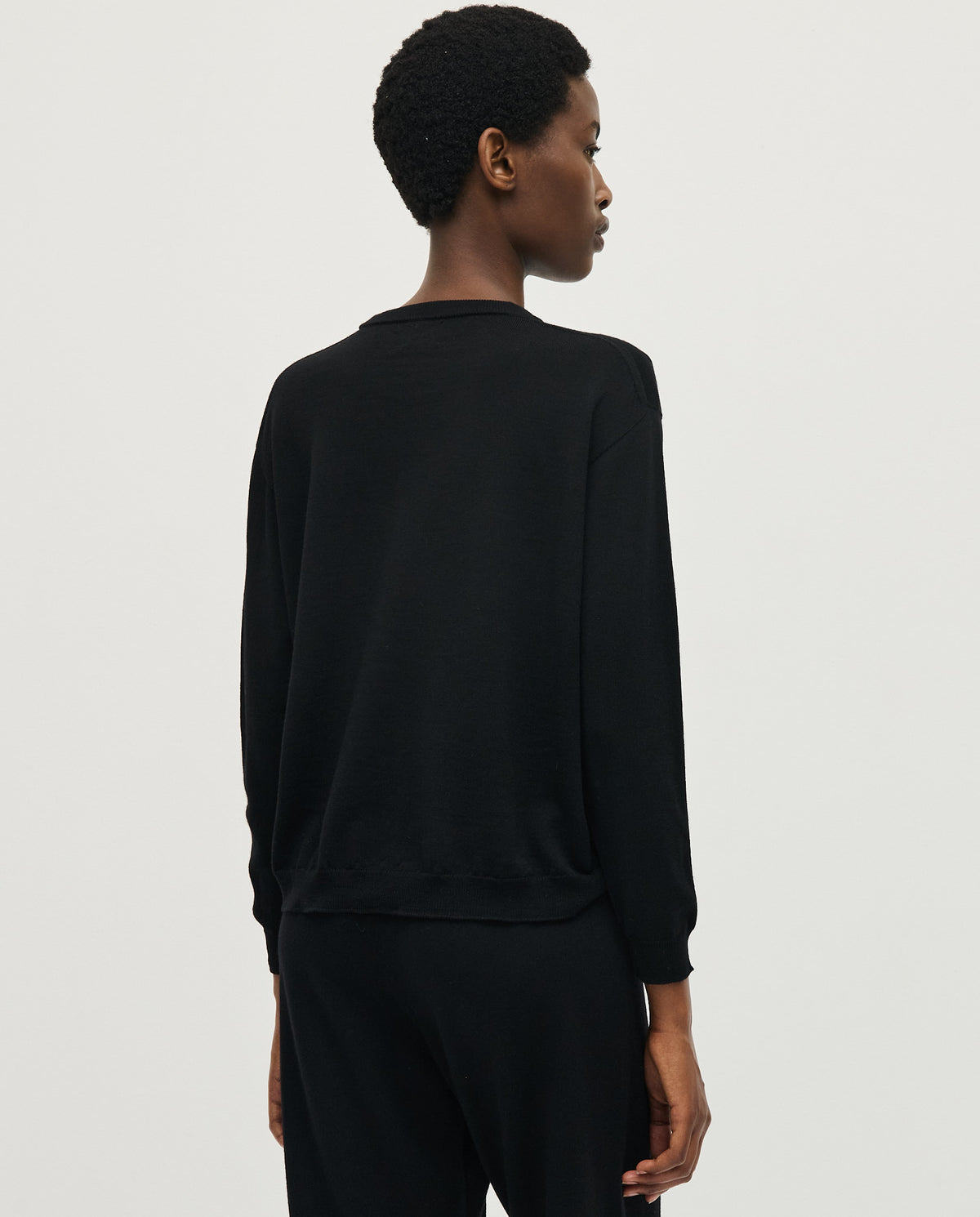 Black women's jumper No25 by Babaà, featuring a cozy knit design and a relaxed fit.