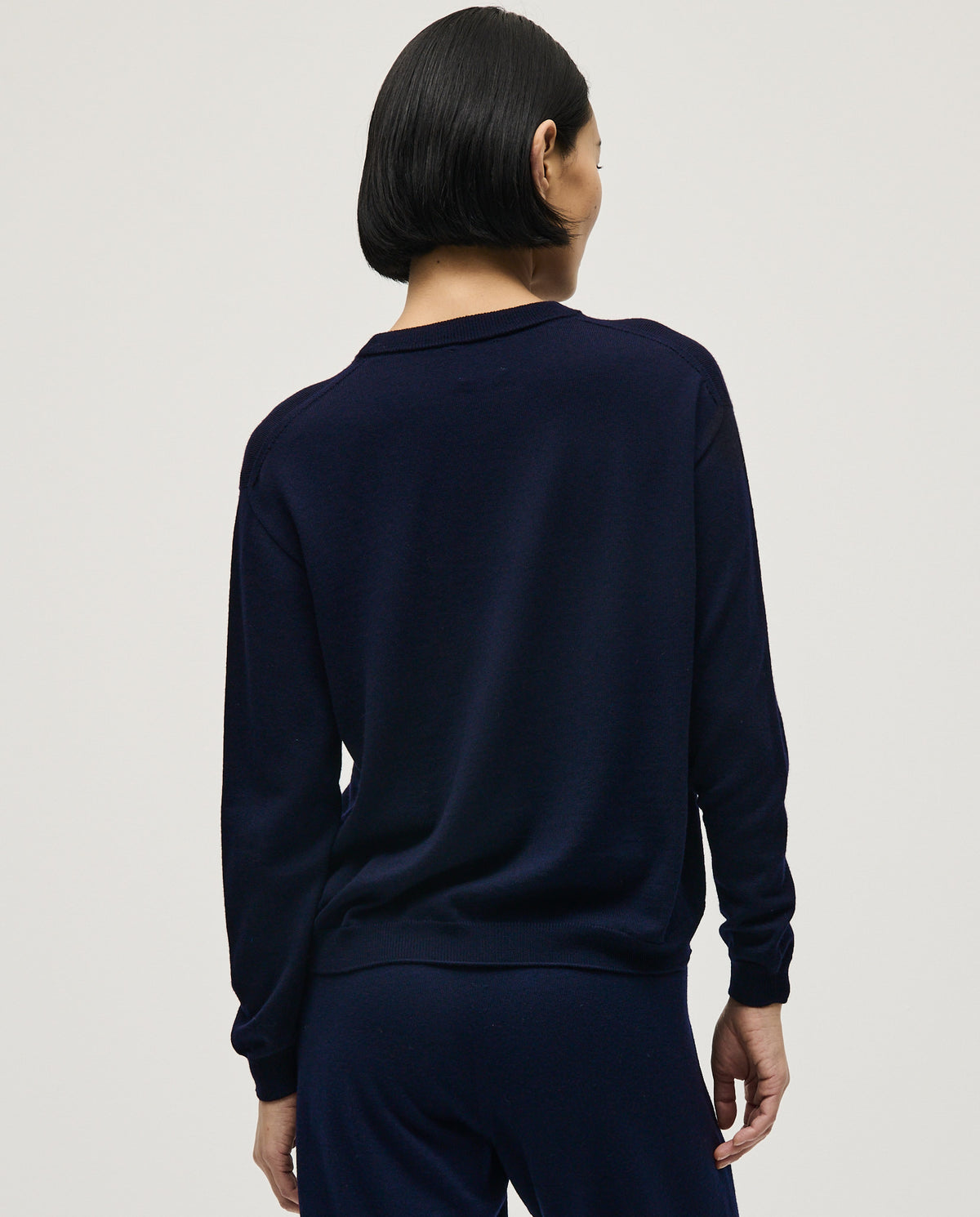 Navy jumper for women by babaà, featuring a cozy knit design and fitted style, perfect for casual or layered outfits.
