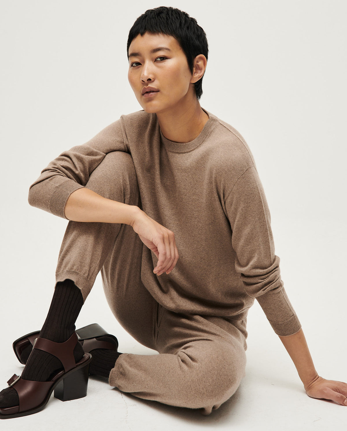 Babaà No25 white jumper for women, soft knit fabric, featuring a relaxed fit and stylish design, shown on a model.