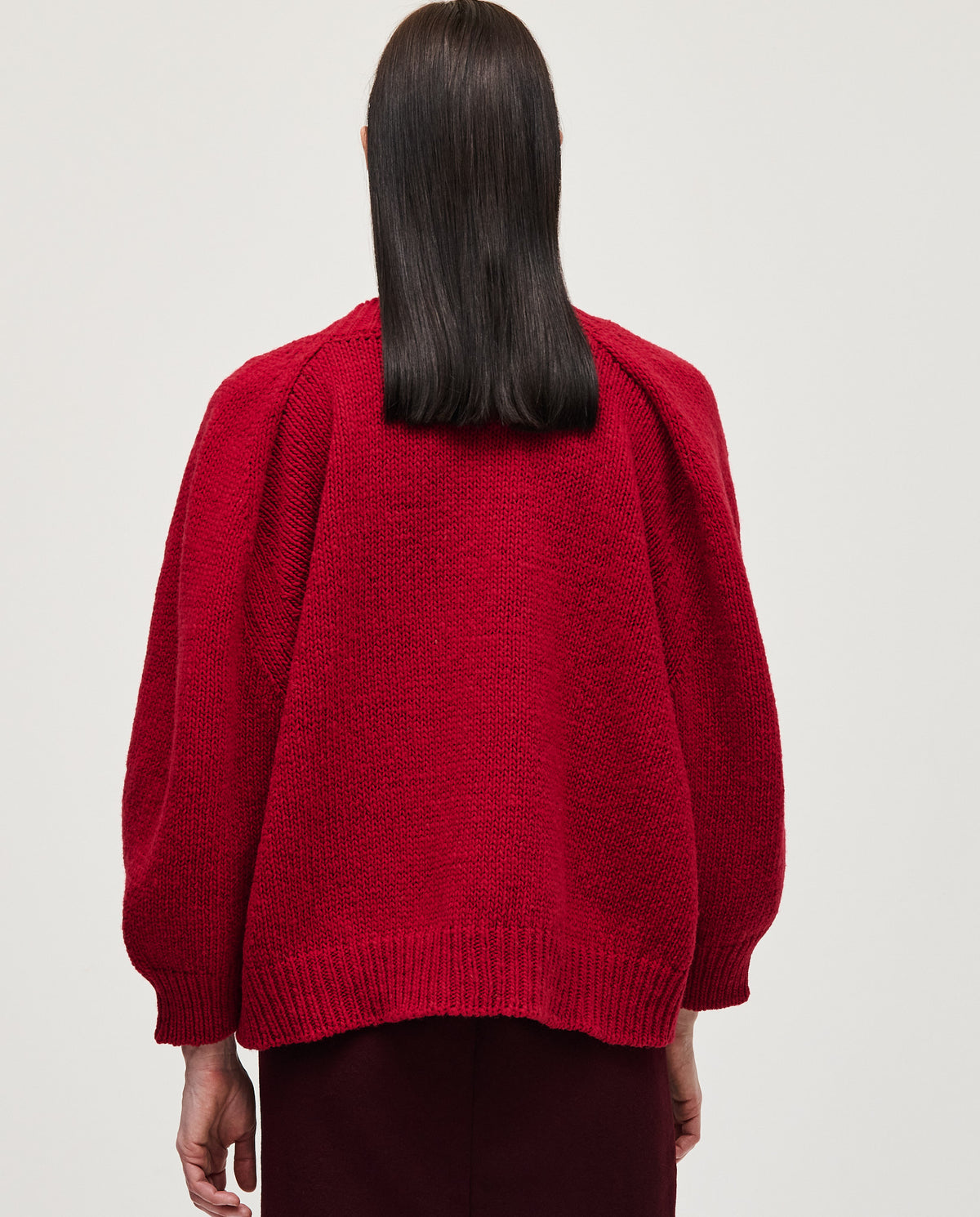 Babaà No29 Cereza women's jumper in vibrant red, featuring a cozy knit design and a relaxed fit.