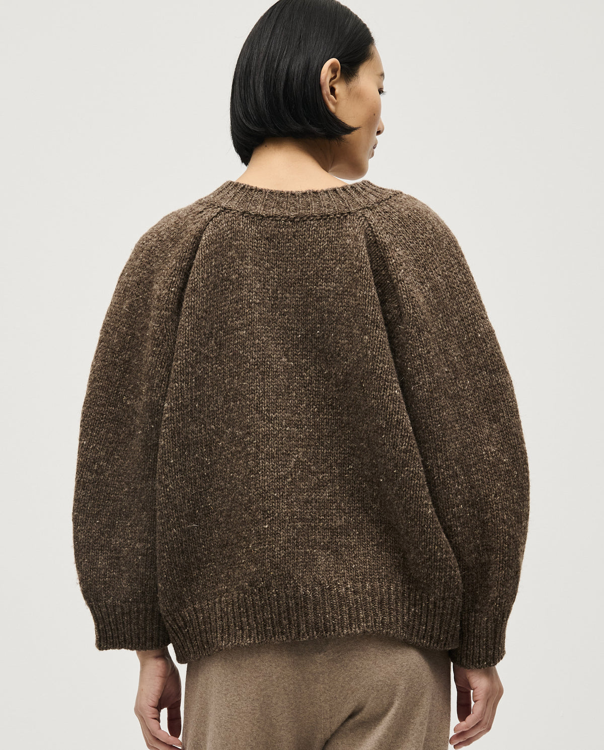 Babaà No29 Oak women's jumper in soft beige, featuring a cozy knit design and long sleeves, perfect for casual wear.