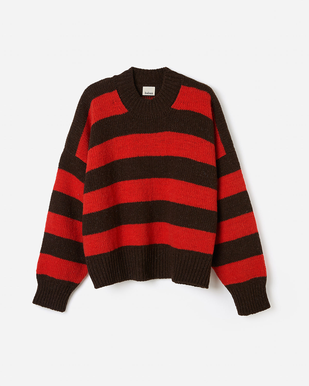 Silhouette of a woman wearing Babaà No40 Alpe jumper, showcasing its stylish knit design and comfortable fit.