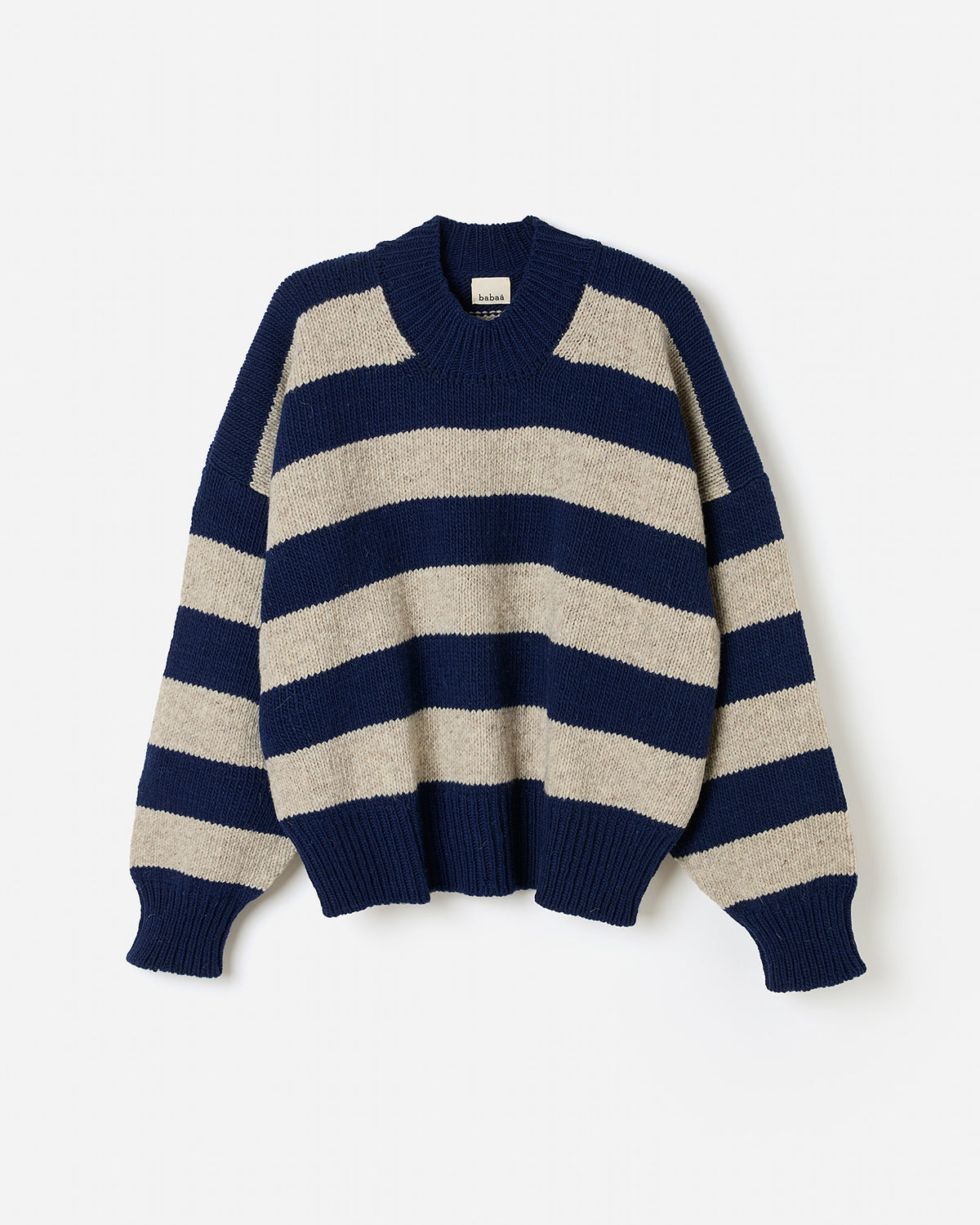 Silhouette of a woman wearing Babaà No40 Marino jumper, showcasing its relaxed fit and soft knit fabric.