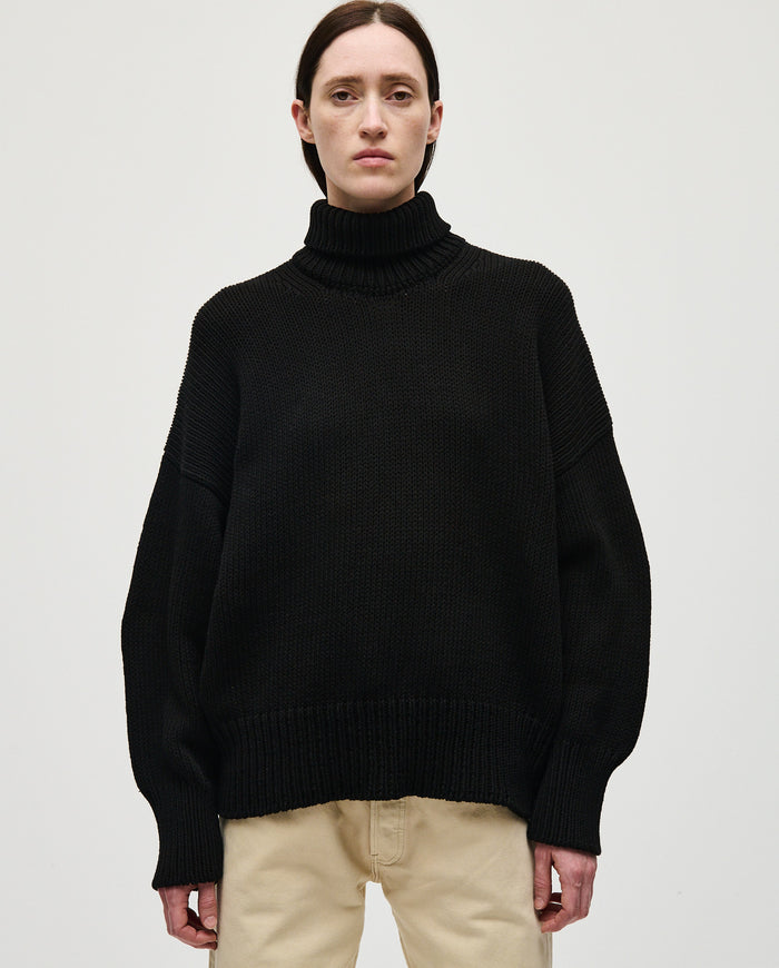 Black women's jumper No42 by Babaà, showcasing a cozy, stylish knit sweater with a relaxed fit.