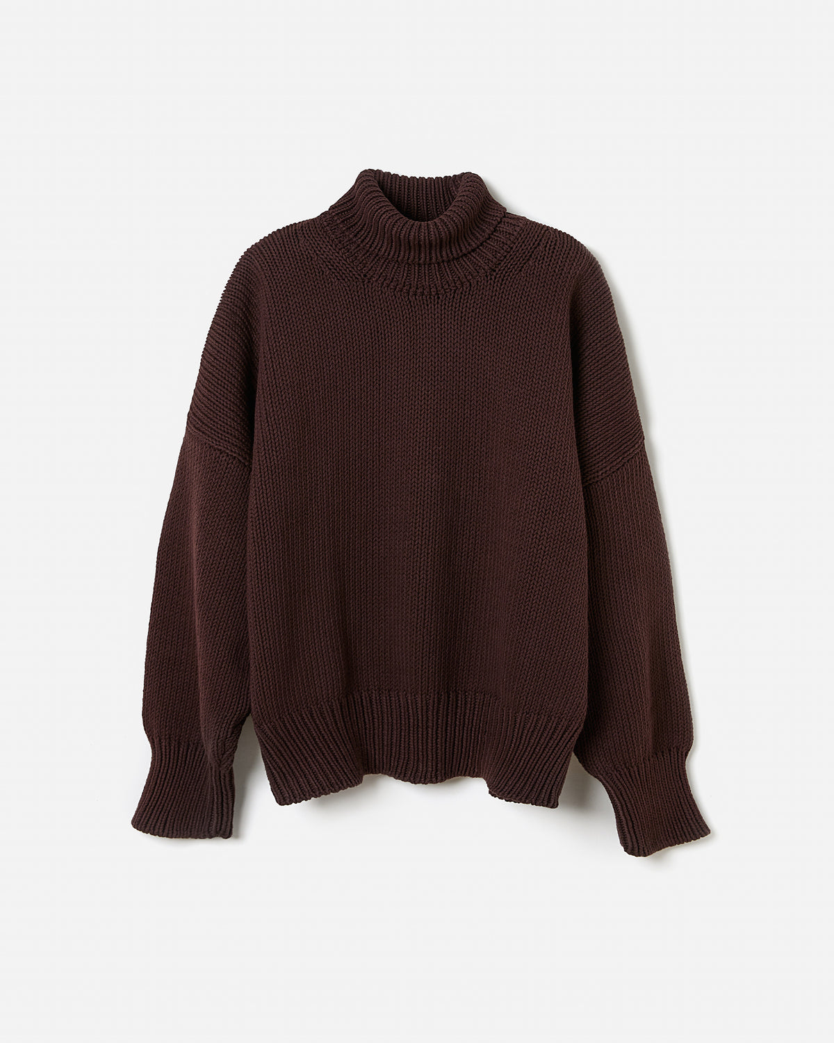 Silhouette of a woman wearing Babaà Jumper No42 Husk, showcasing a cozy, stylish knit sweater in a relaxed fit.