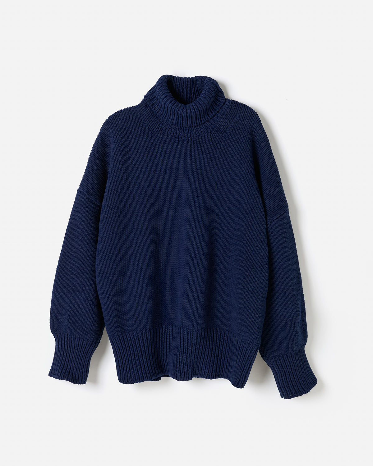 Navy jumper No42 by Babaà worn by a woman, showcasing a stylish, cozy knit sweater with a relaxed fit.