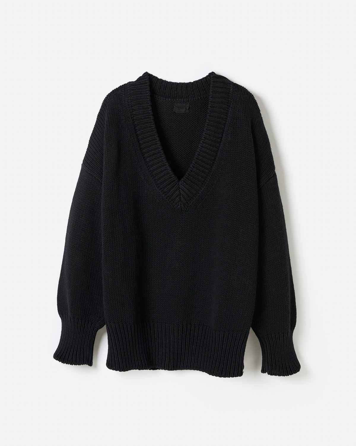 Black Babaà jumper No44 worn by a woman, showing a stylish silhouette and comfortable fit.