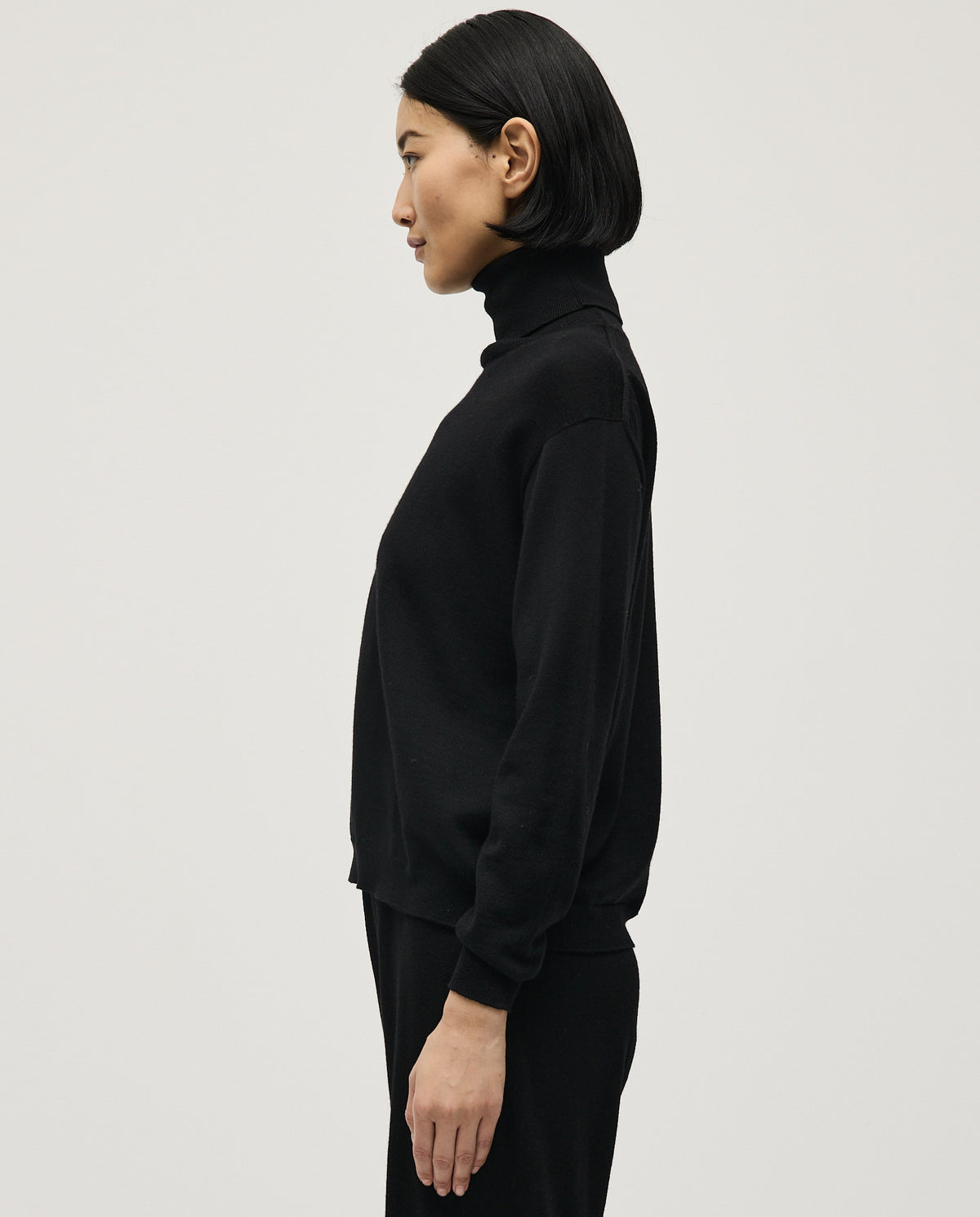 Black Babaà No47 women's jumper, cozy knit sweater with a relaxed fit, showcased on a model in a casual setting.