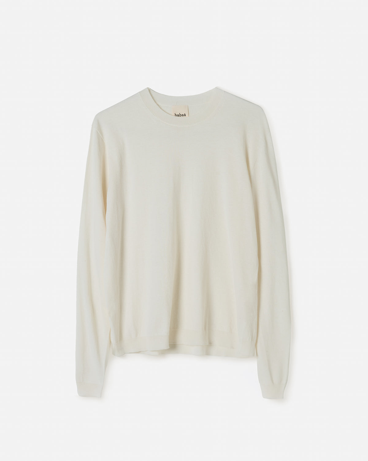 Woman wearing Babaà No50 Natural jumper, showcasing the relaxed fit and soft fabric in a casual silhouette.