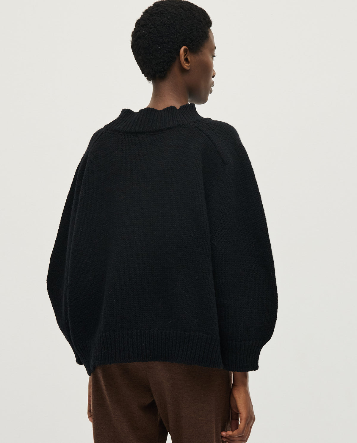 Black women's jumper No51 by Babaà, featuring a cozy knit fabric and a stylish, relaxed fit.