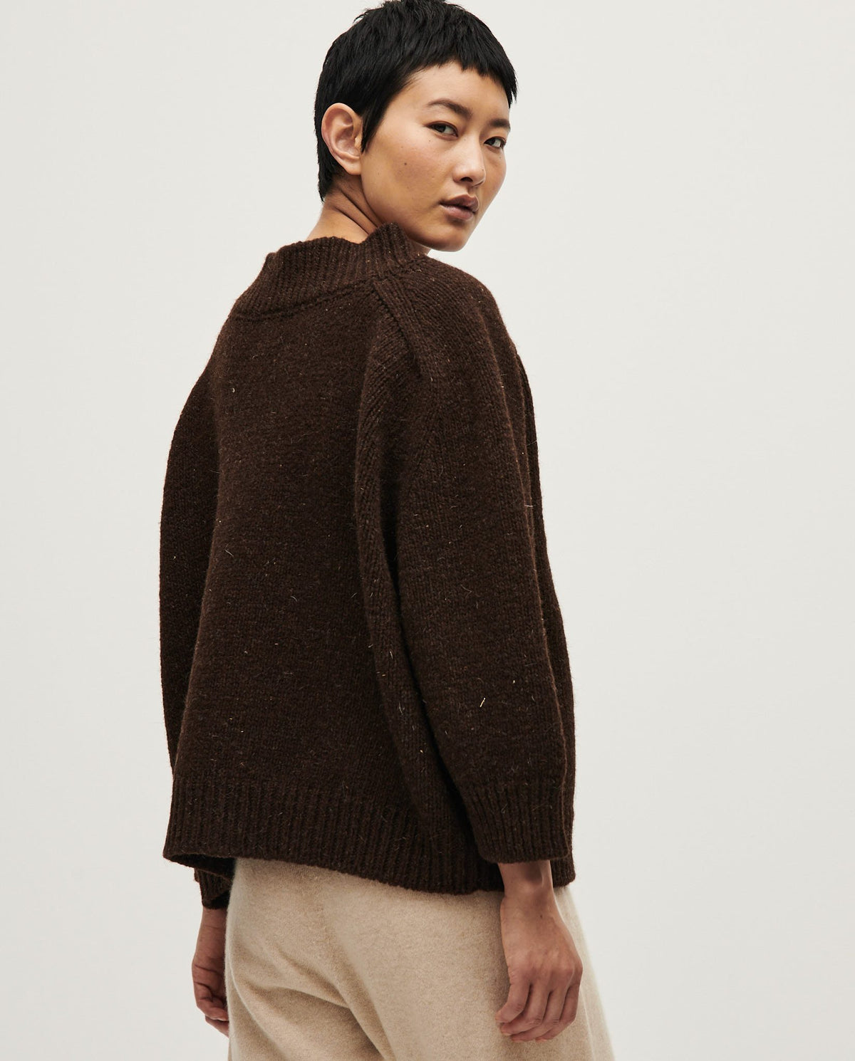 Babaà No51 Earth jumper for women, soft knit sweater in earthy tones, worn by a woman, casual fashion style.