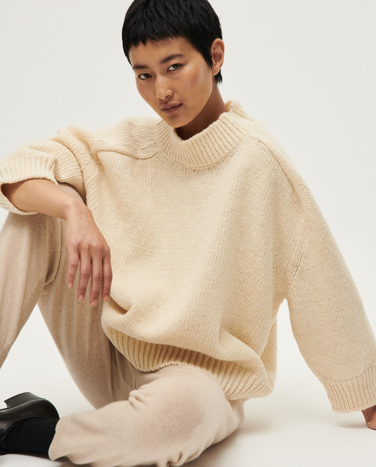 Babaà No51 natural women's jumper, soft knit fabric in a neutral natural color, styled on a model for a casual look
