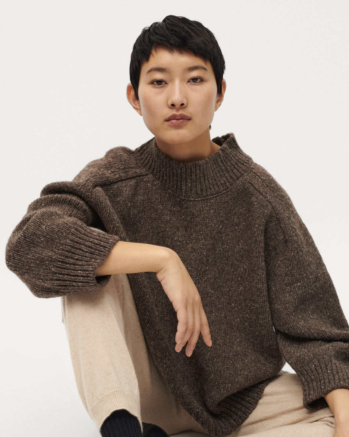 Babaà No51 Oak women's jumper, cozy knit sweater in warm oak color, worn by a woman, stylish and comfortable casual wear.
