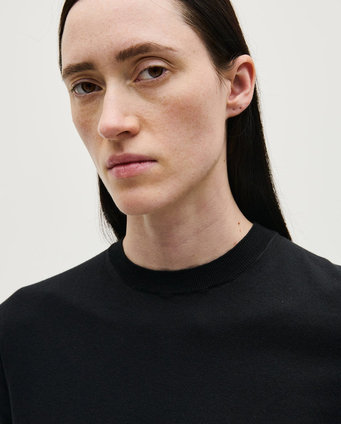 Black Babaà No59 women's jumper displayed on a model, featuring a cozy, stylish knit design perfect for casual wear.