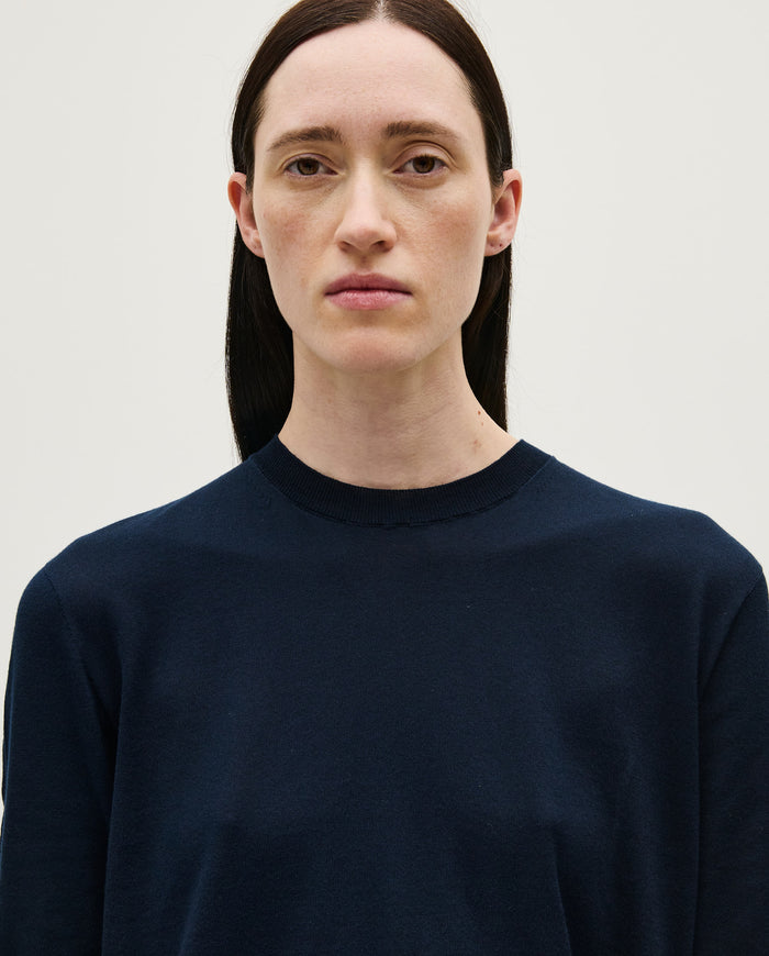 Navy jumper No59 by Babaà, a stylish women's knit sweater with a cozy fit and ribbed cuffs, shown on a model.