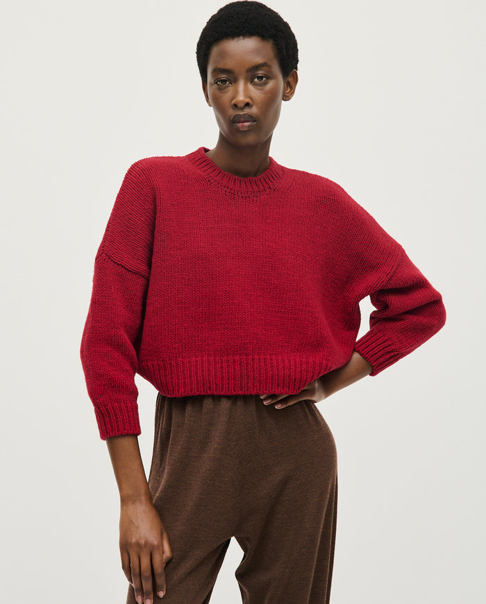 Babaà No61 Cereza women's jumper in vibrant cherry red, featuring a cozy knit design and long sleeves.