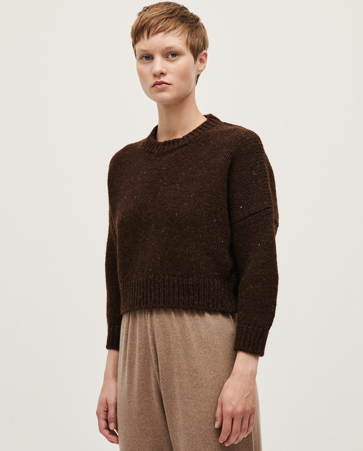 Babaà No61 Earth women's jumper in soft earthy tone, featuring a cozy knit with long sleeves and a relaxed fit.