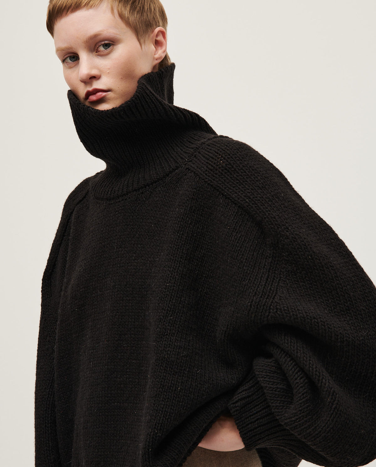 Black Babaà No67 women's jumper displayed on a model, featuring a cozy, stylish knit design perfect for casual wear.