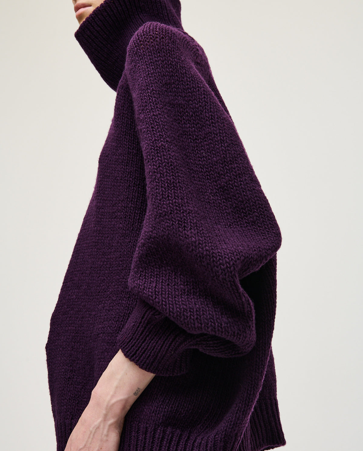 Purple women's jumper No67 by Babaà, featuring a cozy knit design and relaxed fit, shown on a model.