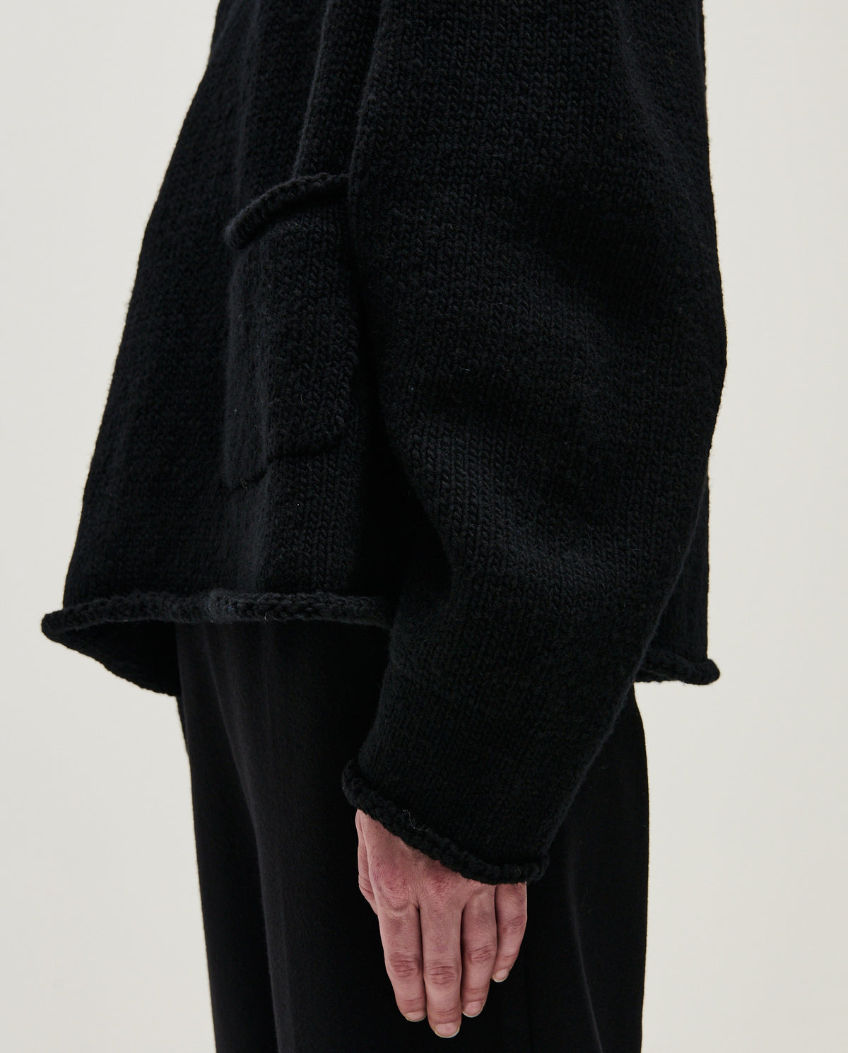 Black Babaà No70 women's jumper, soft knit fabric, fitted style, and round neckline, shown on a model.