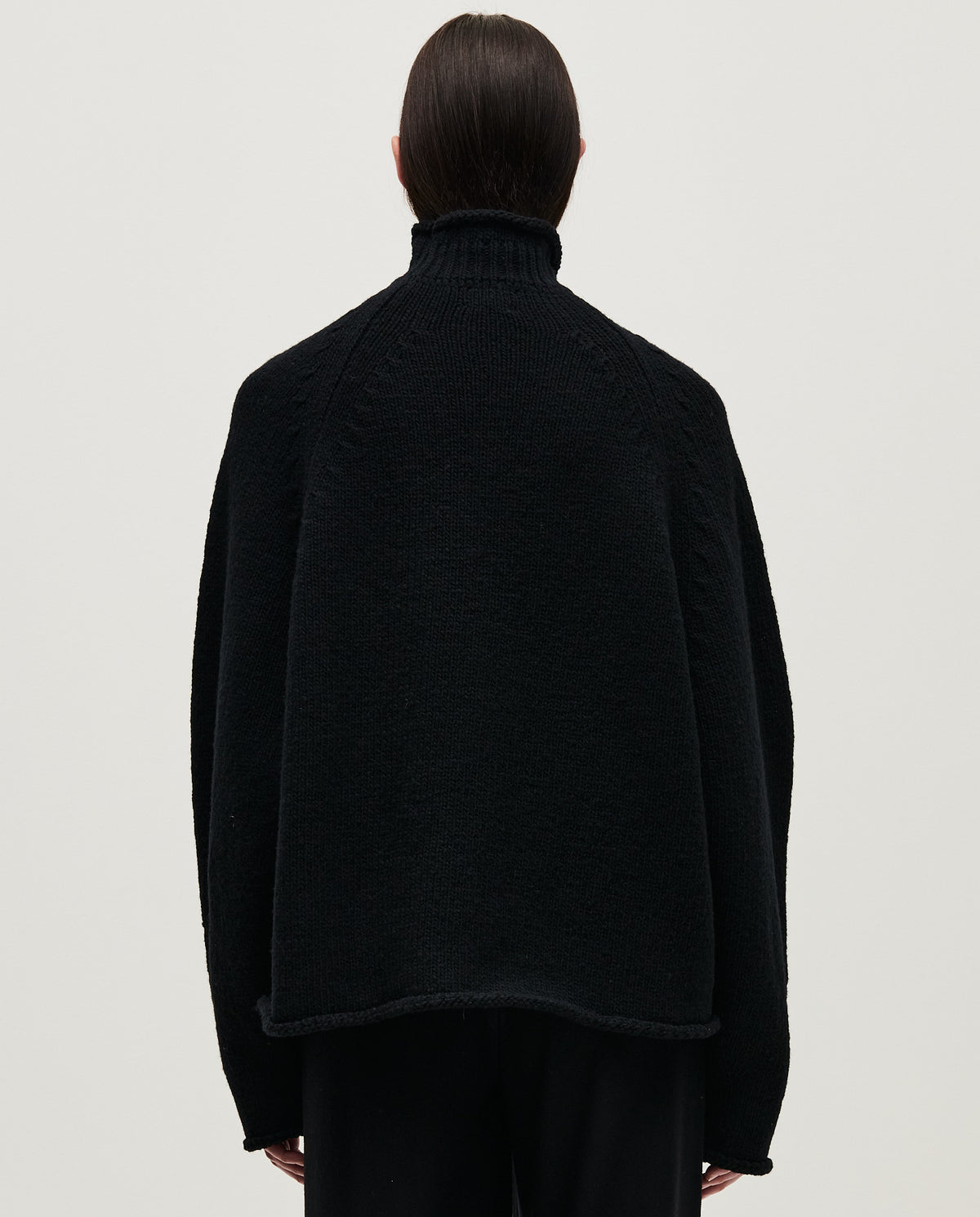 Black Babaà No70 women's jumper, showcasing a cozy knit fabric and stylish fit on a model.