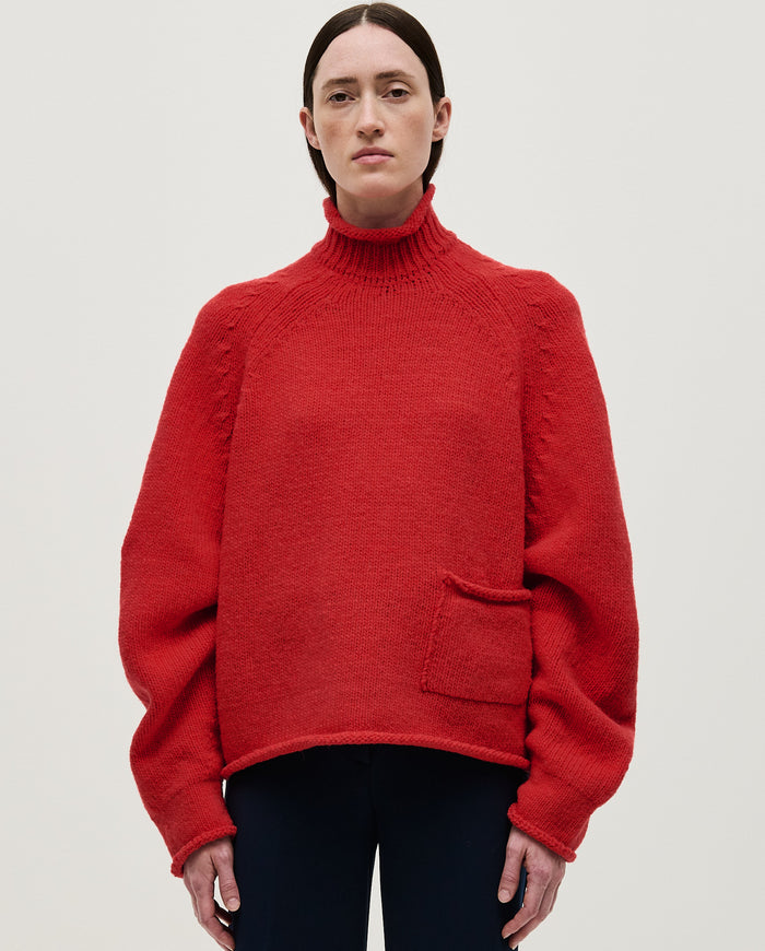 Red Babaà No70 women's jumper, soft knit fabric, fitted style, displayed on a model with a plain background.