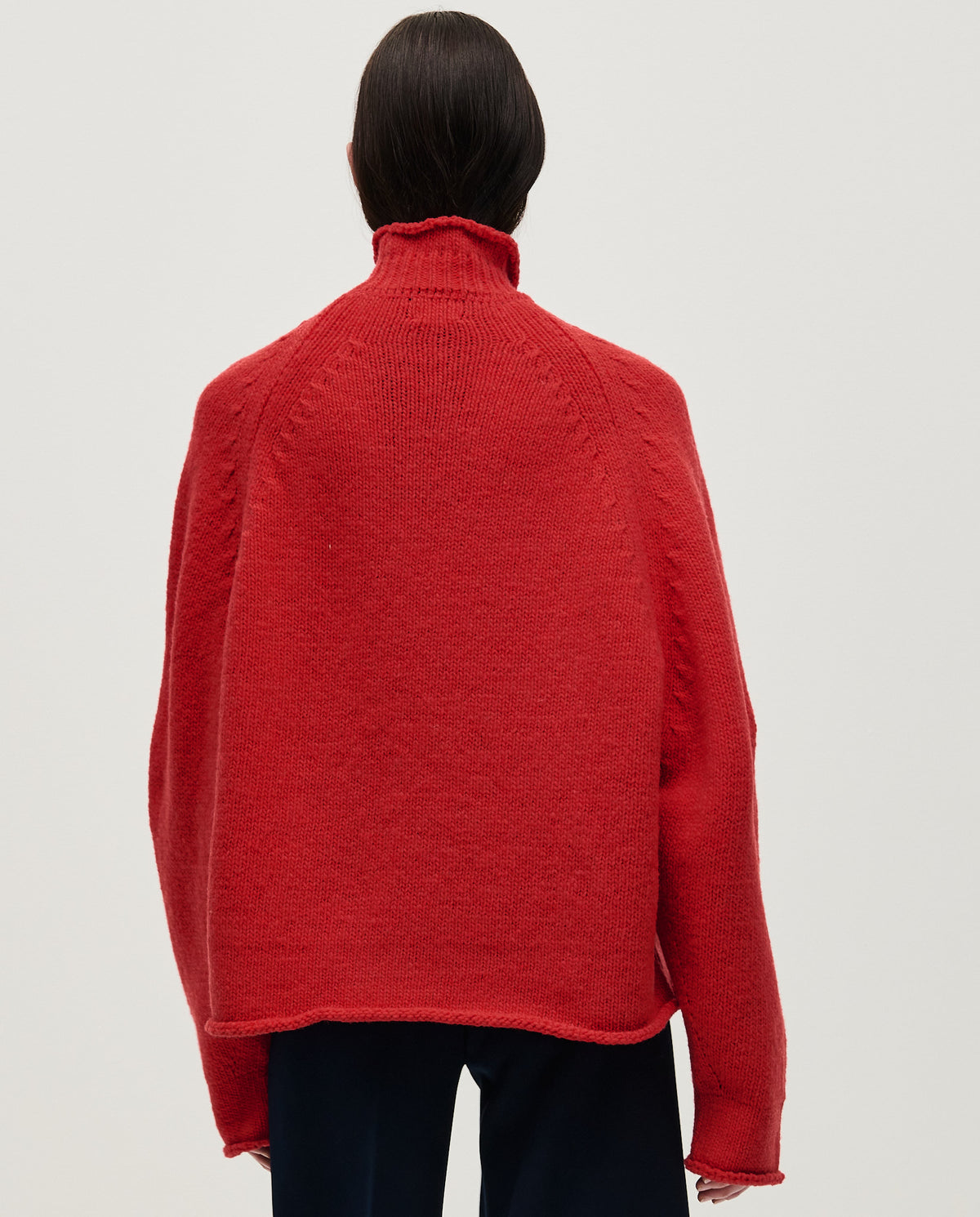 Red Babaà No70 women's jumper, soft knit sweater with a relaxed fit, shown on a woman in a casual outfit.