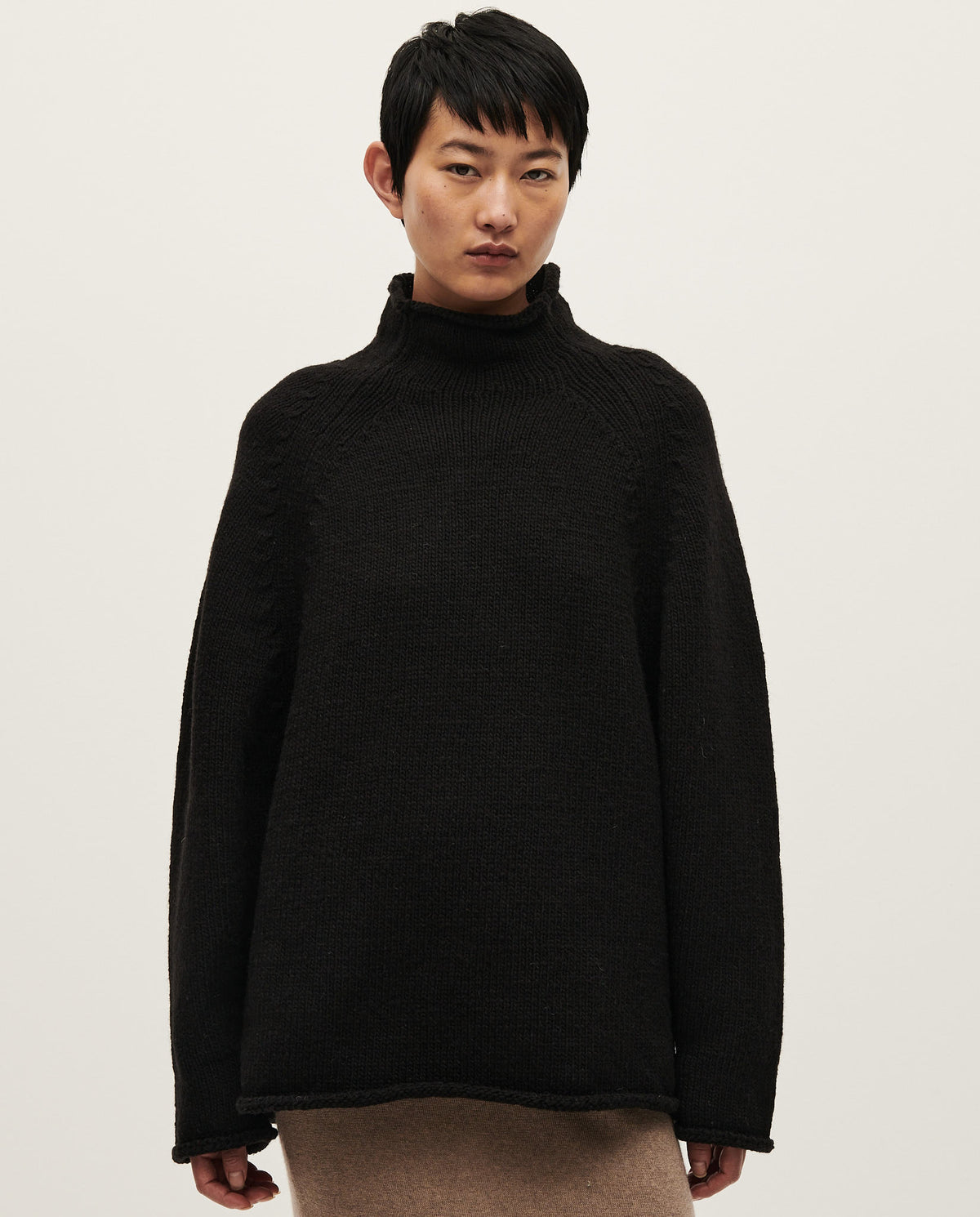 Black Babaà No81 women's jumper, cozy knit sweater with a relaxed fit, displayed on a neutral background.