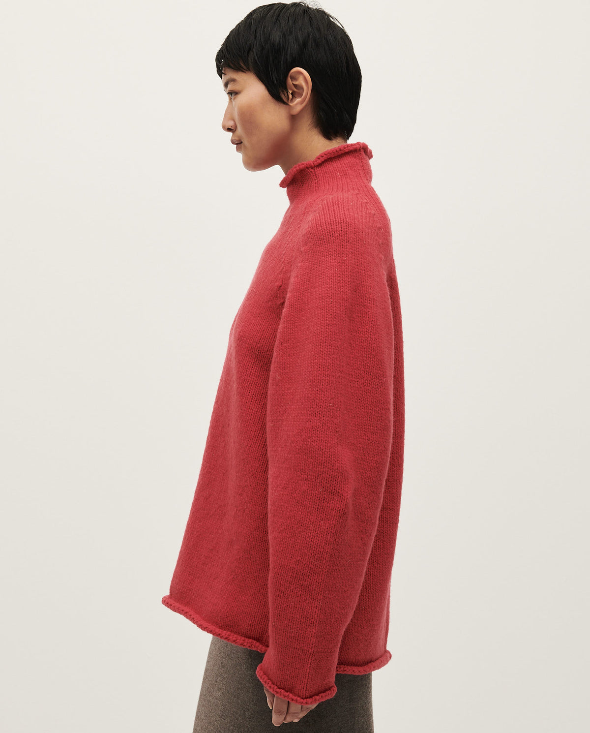 Babaà No81 Ruby women's jumper featuring a cozy, vibrant red knit design and a relaxed fit, perfect for casual wear.