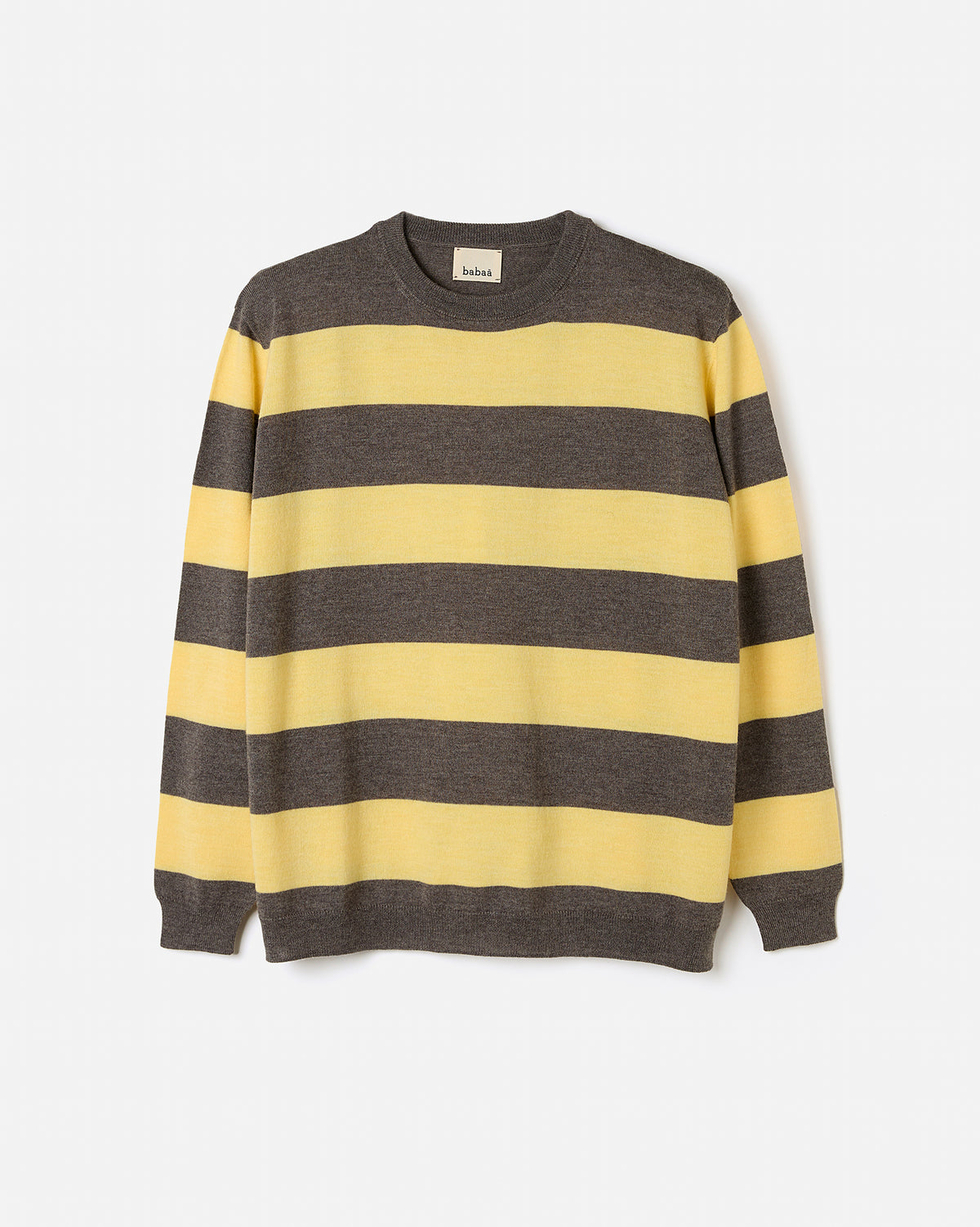 Woman wearing Babaà No84 Hay jumper, stylish silhouette showing the cozy, relaxed fit of the knitted sweater.