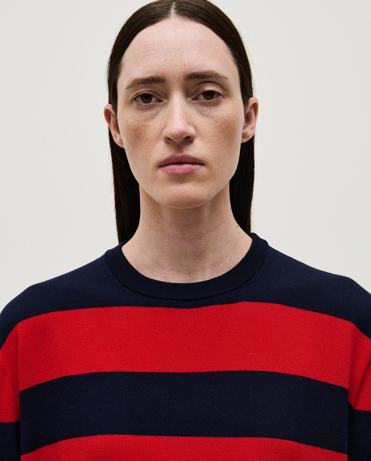 Babaà No84 Poppy women's jumper featuring a cozy knit fabric and vibrant red color, worn by a model.