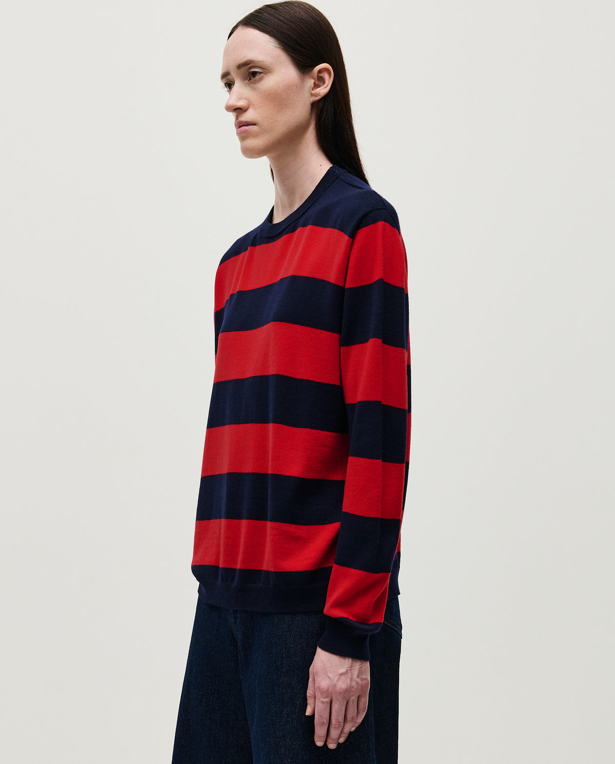 Babaà No84 Poppy women's jumper, cozy knit sweater in vibrant red with a relaxed fit, worn by a model.