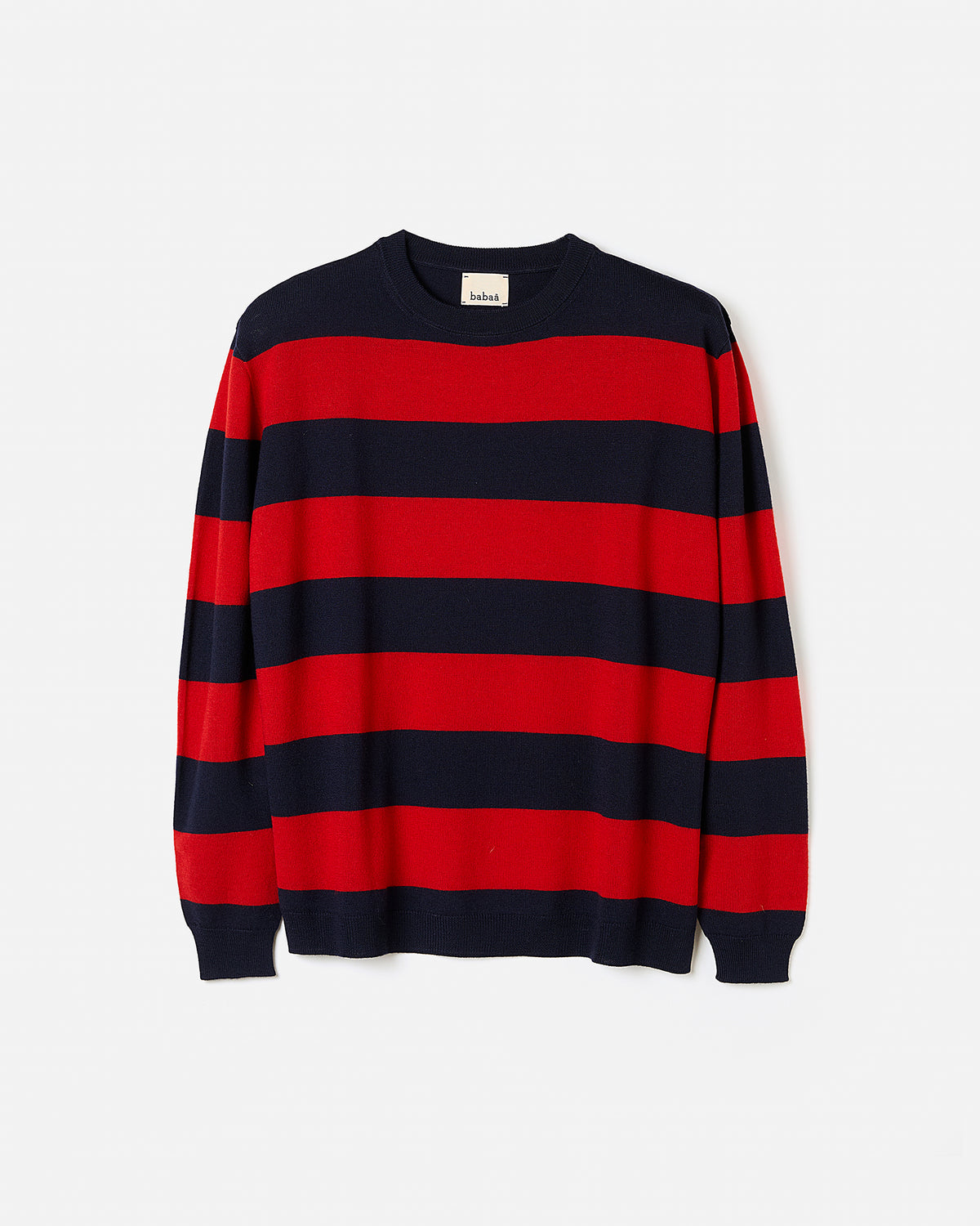 Woman wearing Babaà No84 Poppy jumper, featuring a cozy knit design in a vibrant poppy color.