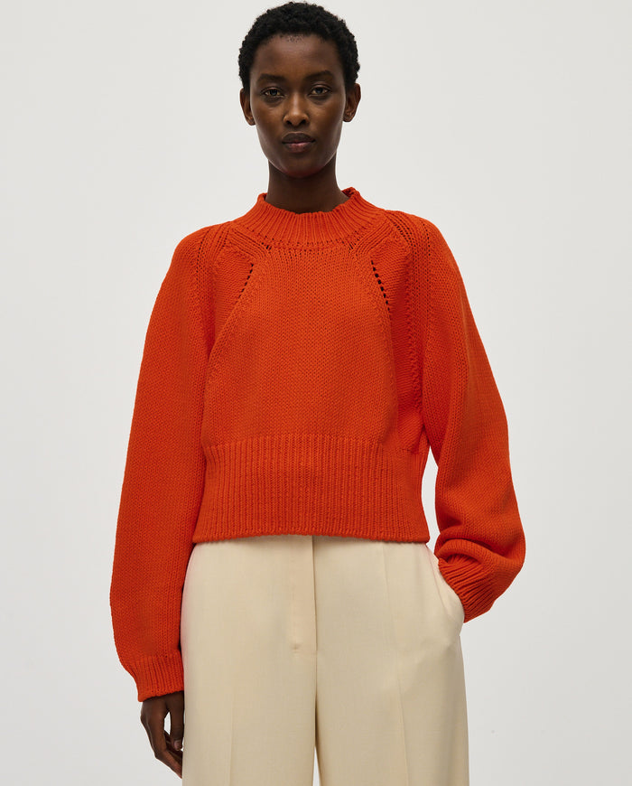 Babaà No86 summer flame jumper worn by a woman, featuring a vibrant flame design in a casual and stylish fit.