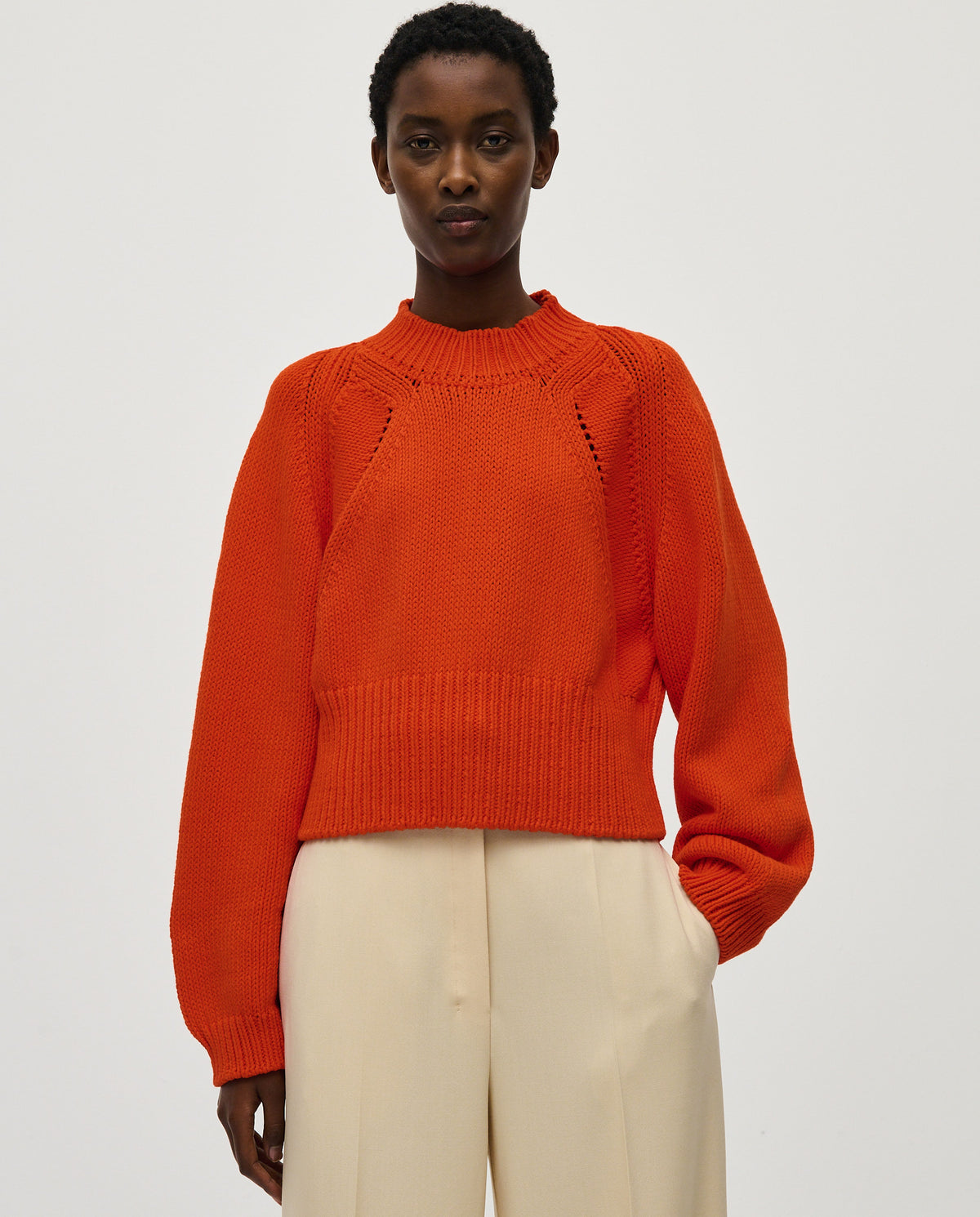 Babaà No86 summer flame jumper worn by a woman, featuring a vibrant flame design in a casual and stylish fit.