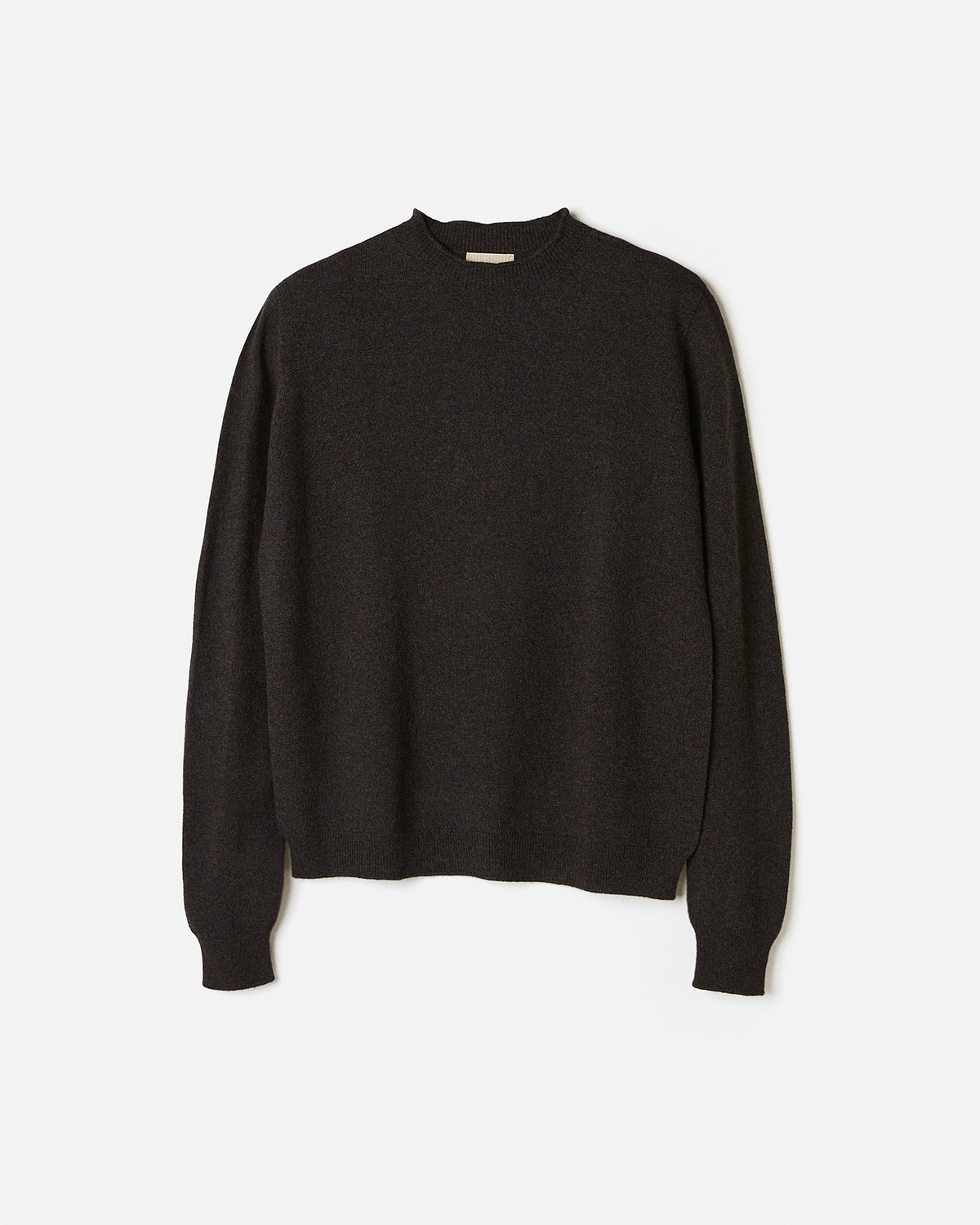 Woman wearing Babaà No89 Mica jumper, stylish silhouette in a cozy knit sweater, showcasing a relaxed fit and soft fabric.