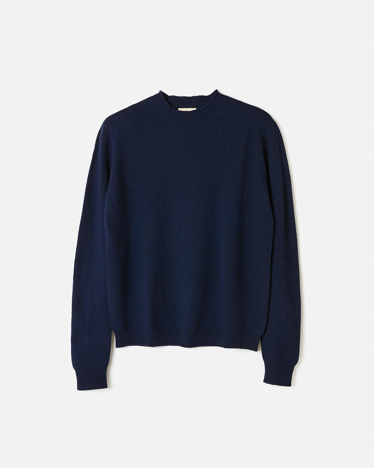 Silhouette of a woman wearing Babaà Jumper No89 Tinta, showcasing its relaxed fit and stylish design.